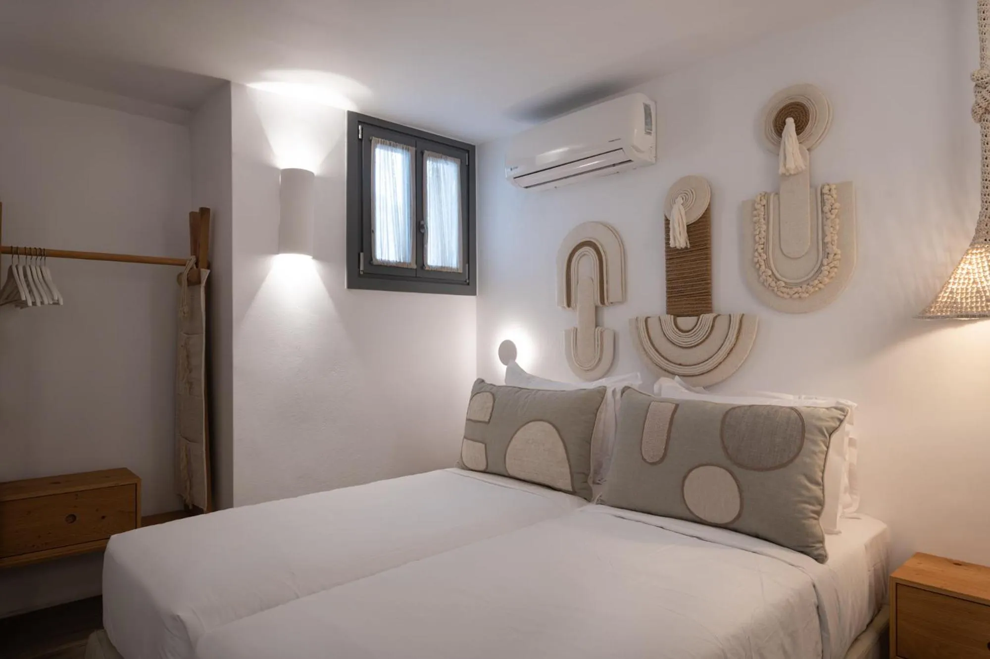 Bed in Kosmitis Suites & Villas