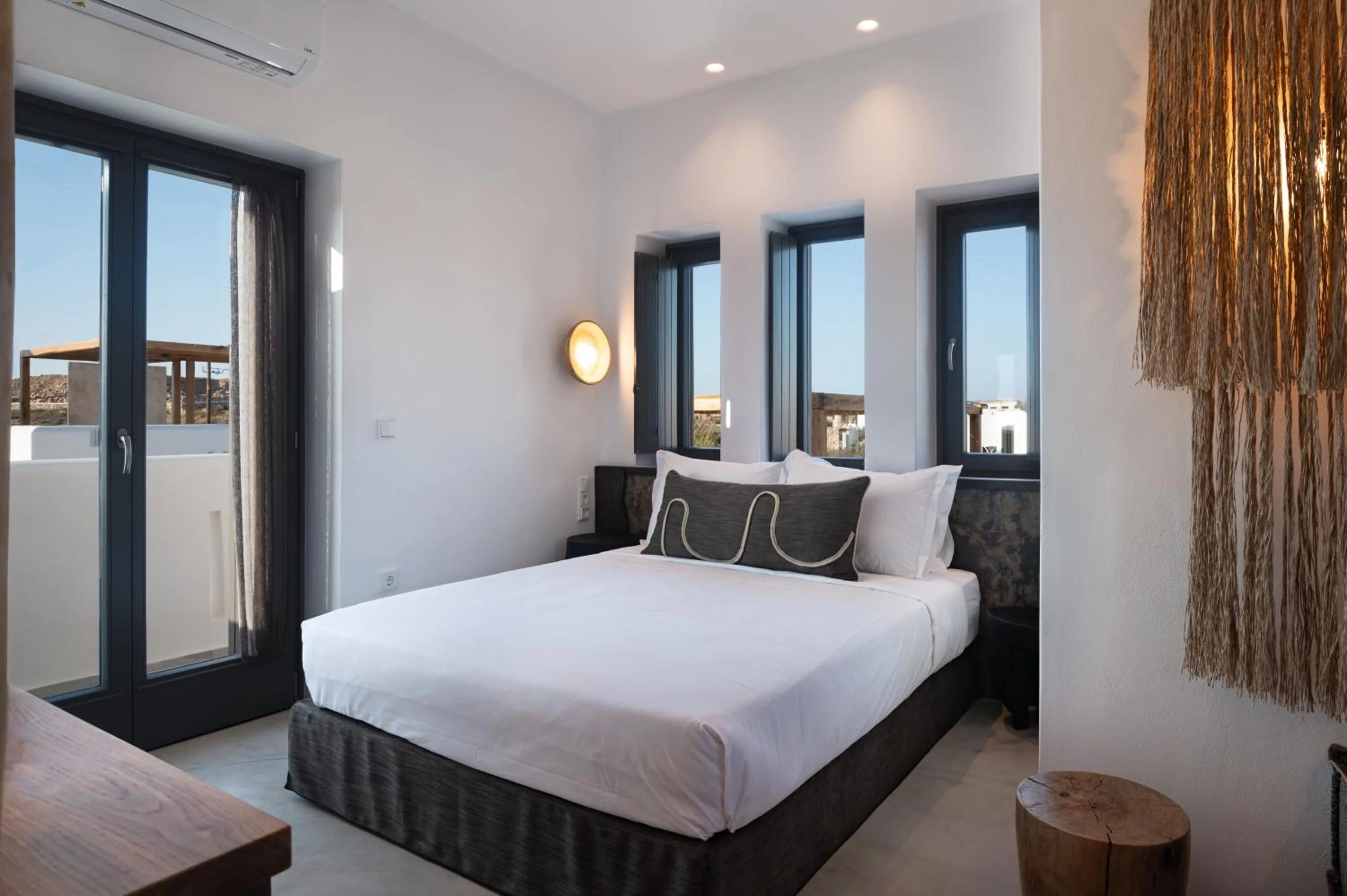 Bed in Kosmitis Suites & Villas