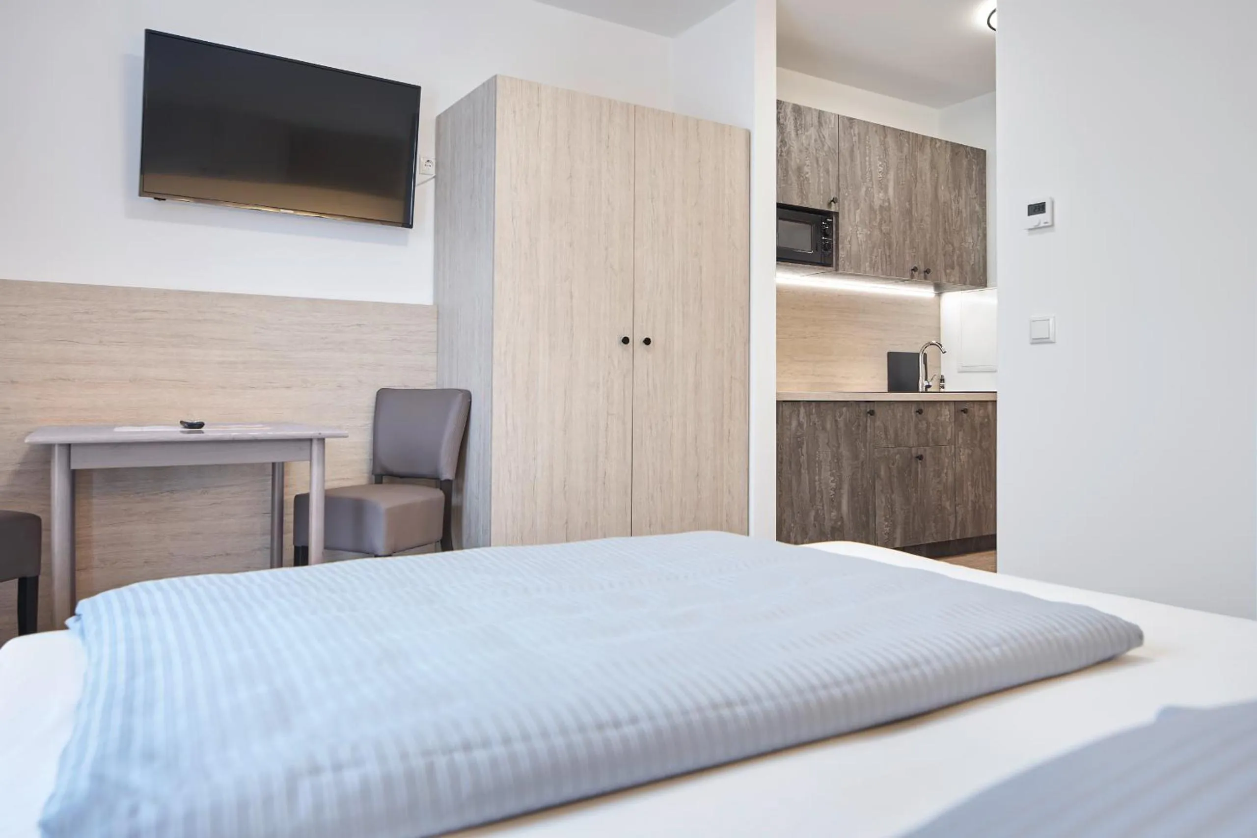 TV and multimedia, Bed in Bader Aparthotel