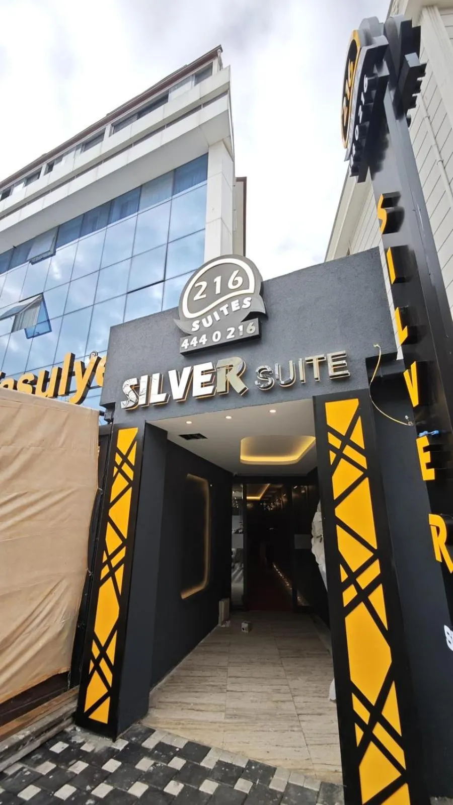 Property logo or sign in 216 Silver Suite