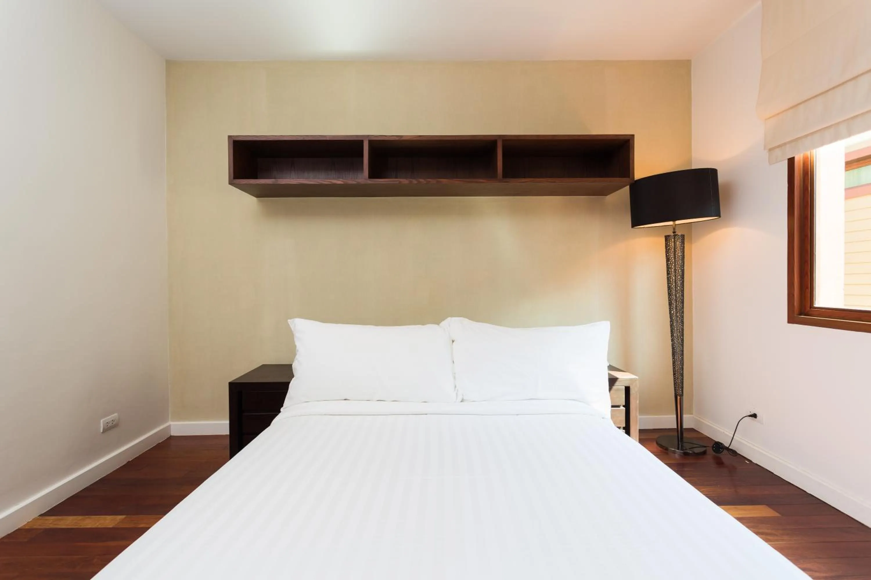 Bed in Amatapura Beachfront Villa 15, SHA Certified