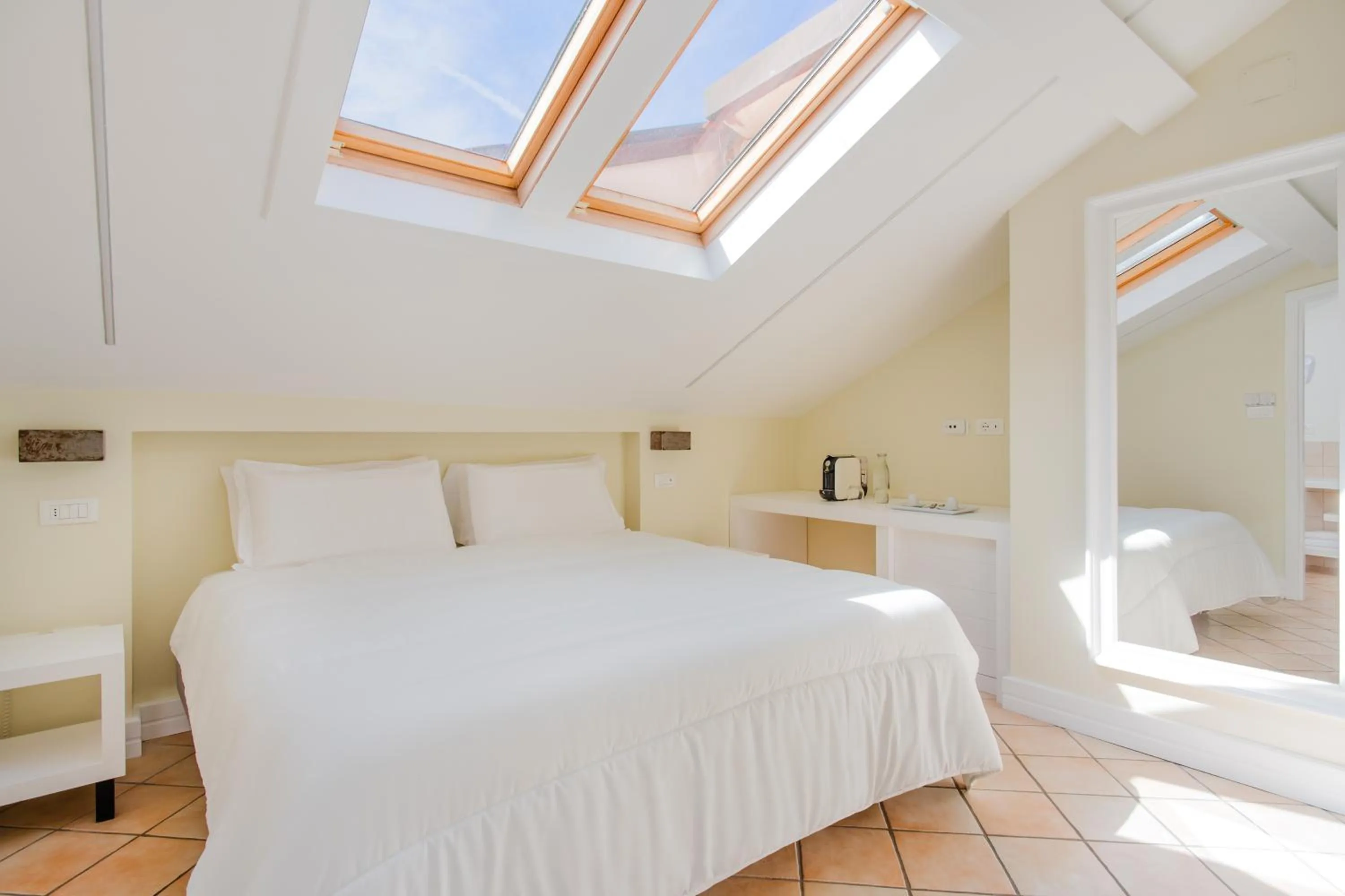 Bed in Palazzo Gargiulo Luxury Rooms & Suites