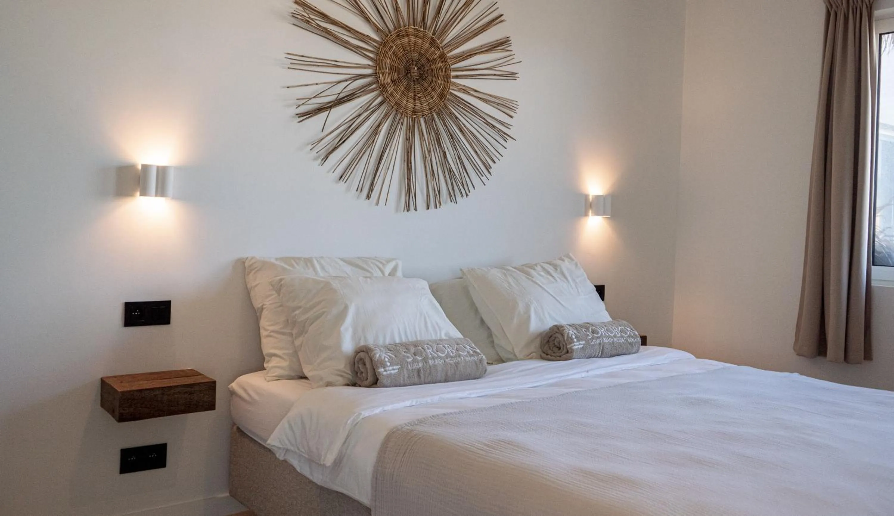 Bed in Sorobon Bay Hotel