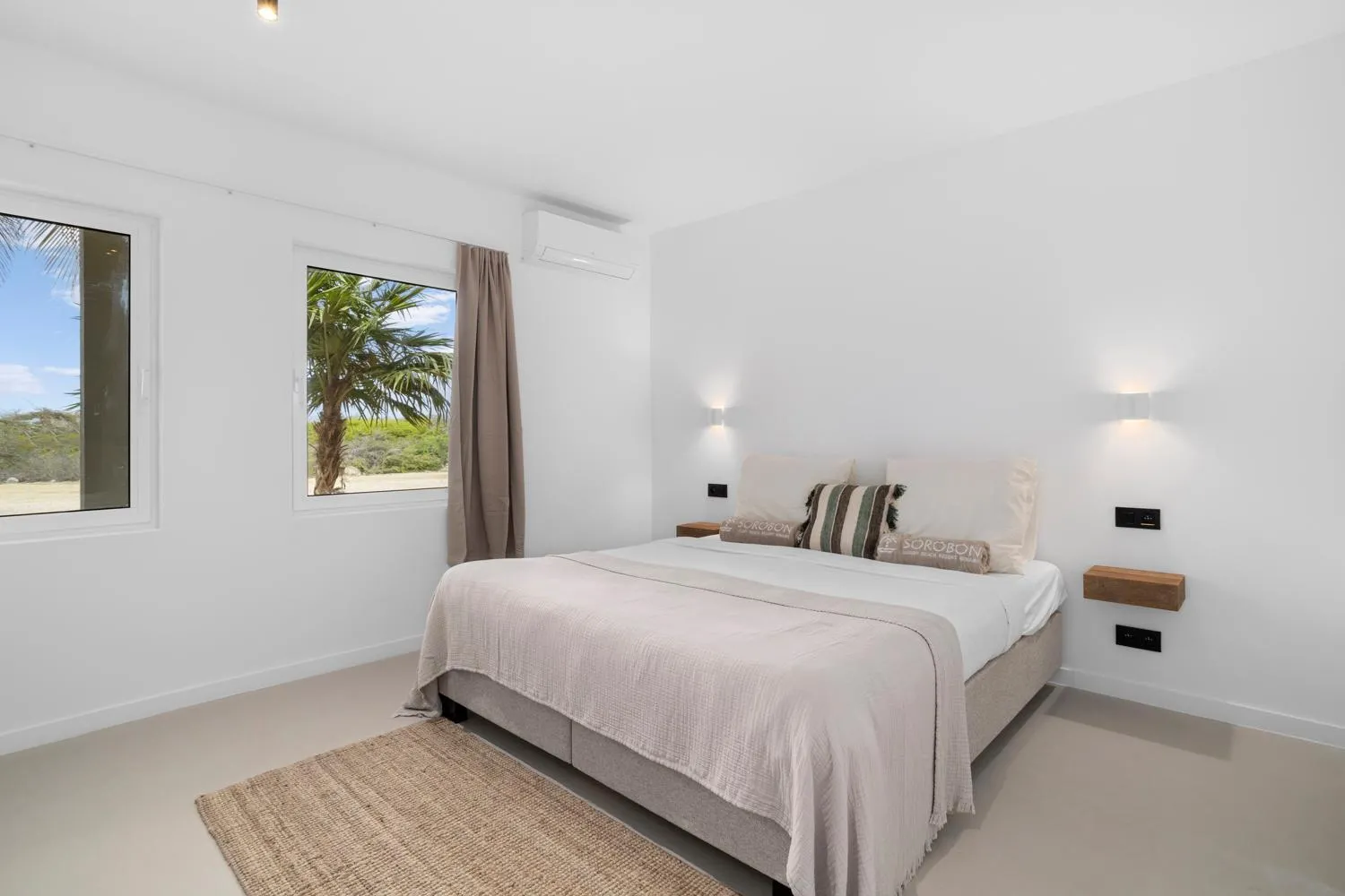 Bed in Sorobon Bay Hotel