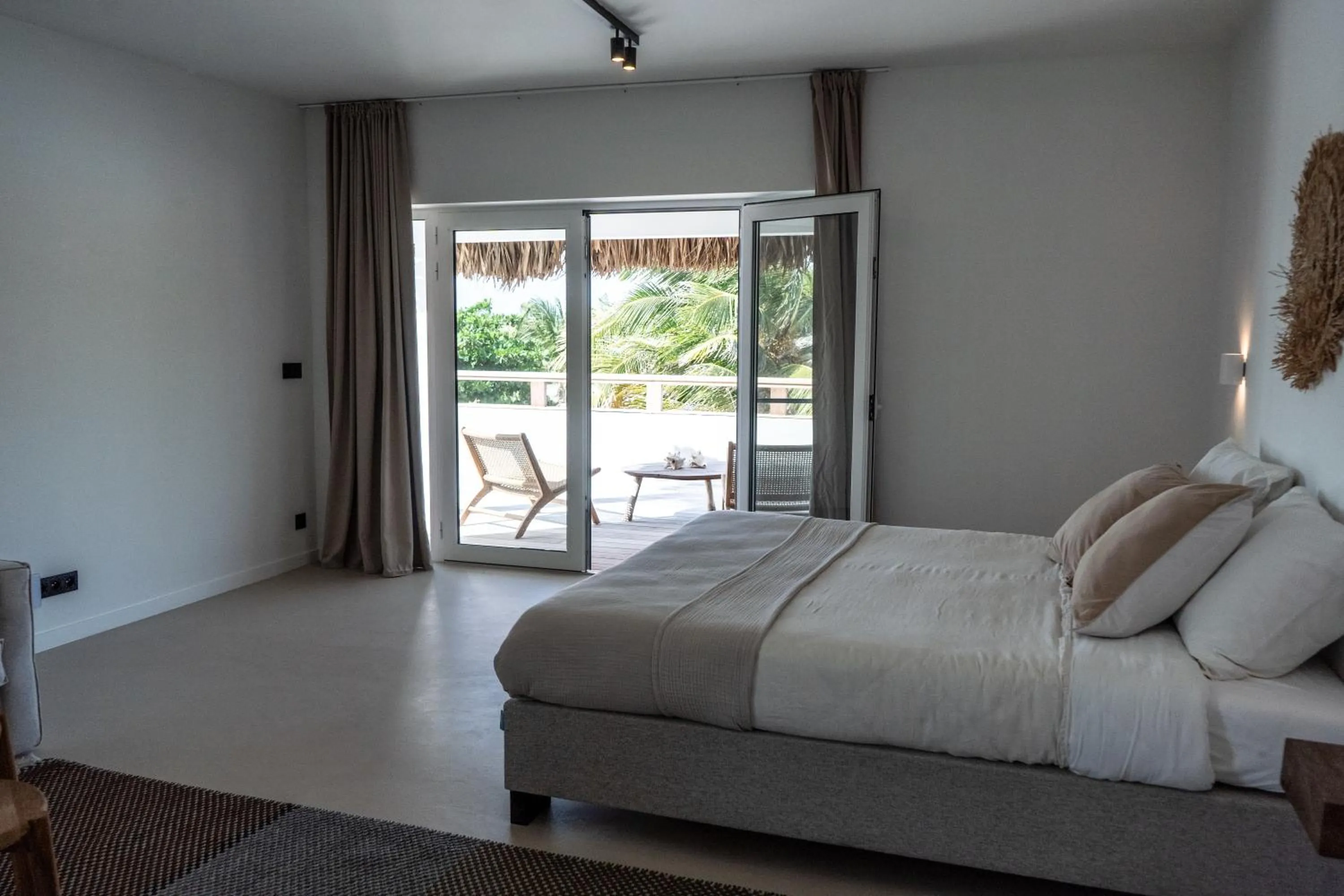 Bed in Sorobon Bay Hotel