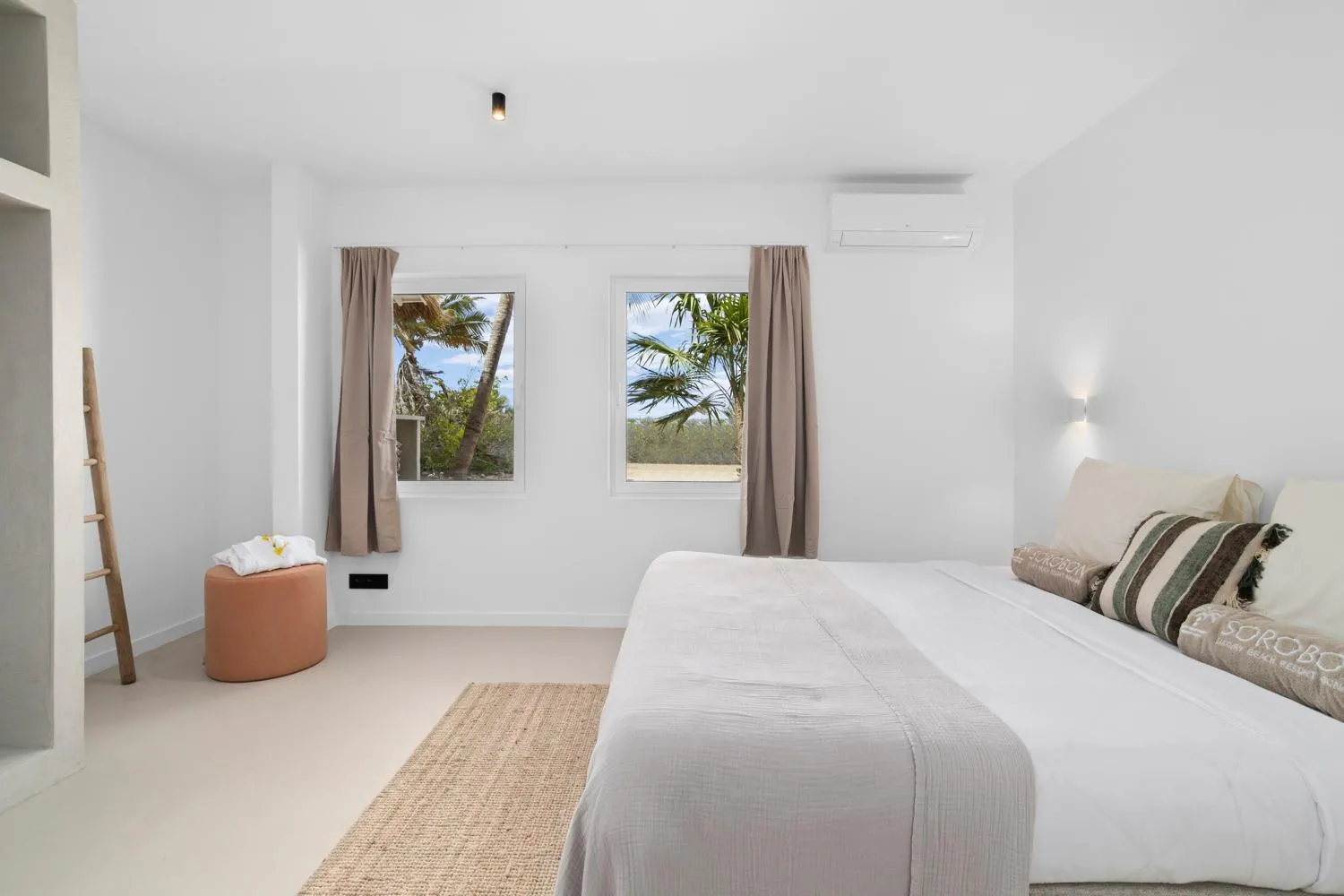 Bed in Sorobon Bay Hotel