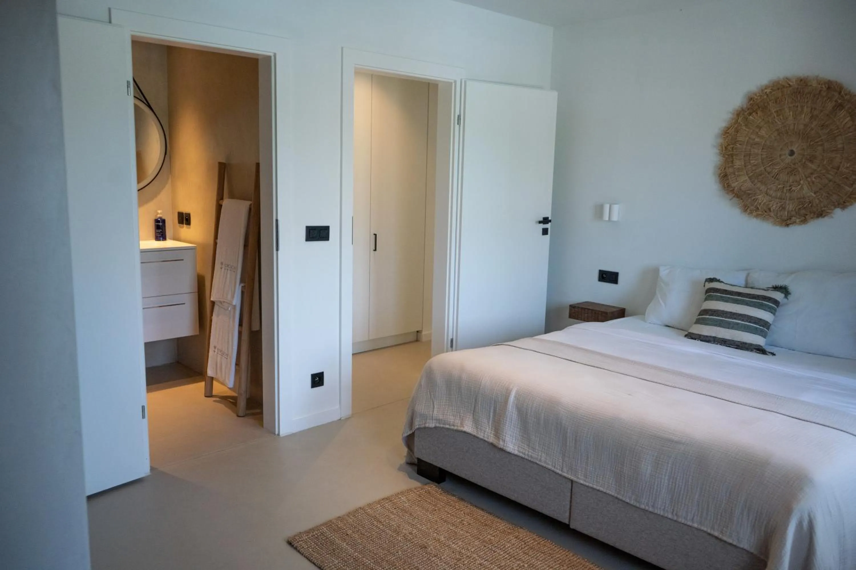 Bed in Sorobon Bay Hotel