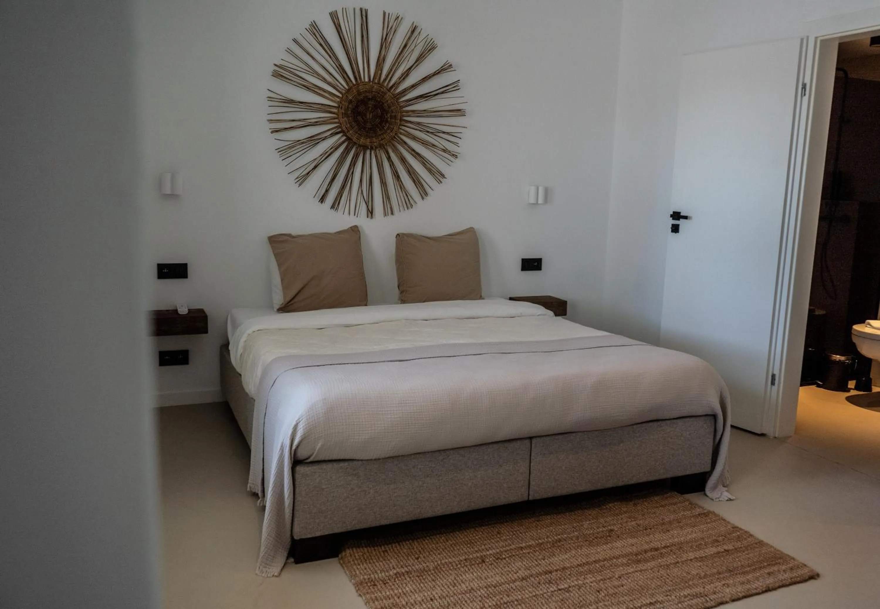 Bed in Sorobon Bay Hotel