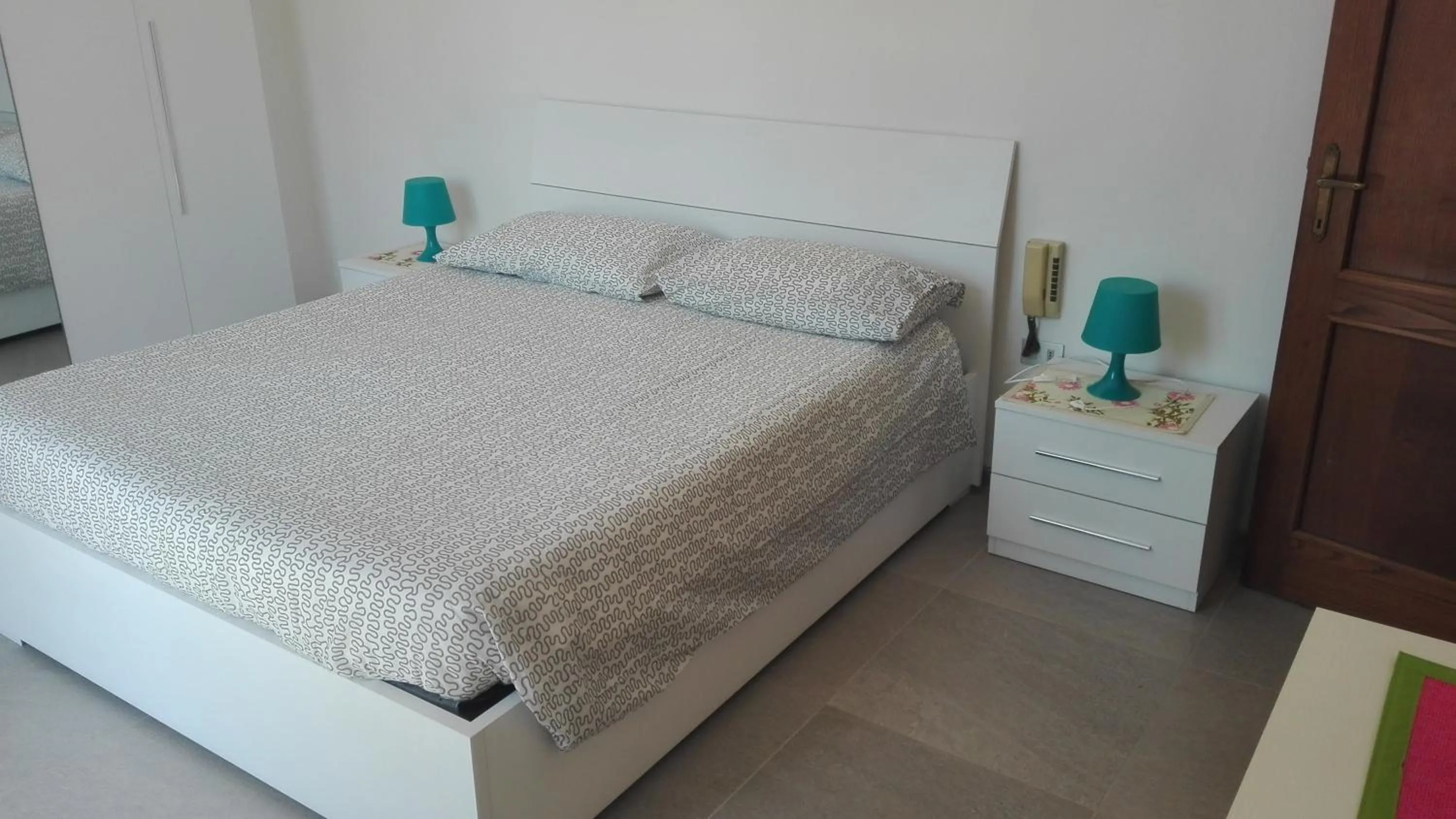 Bedroom, Bed in Appartamento Sezzate 40