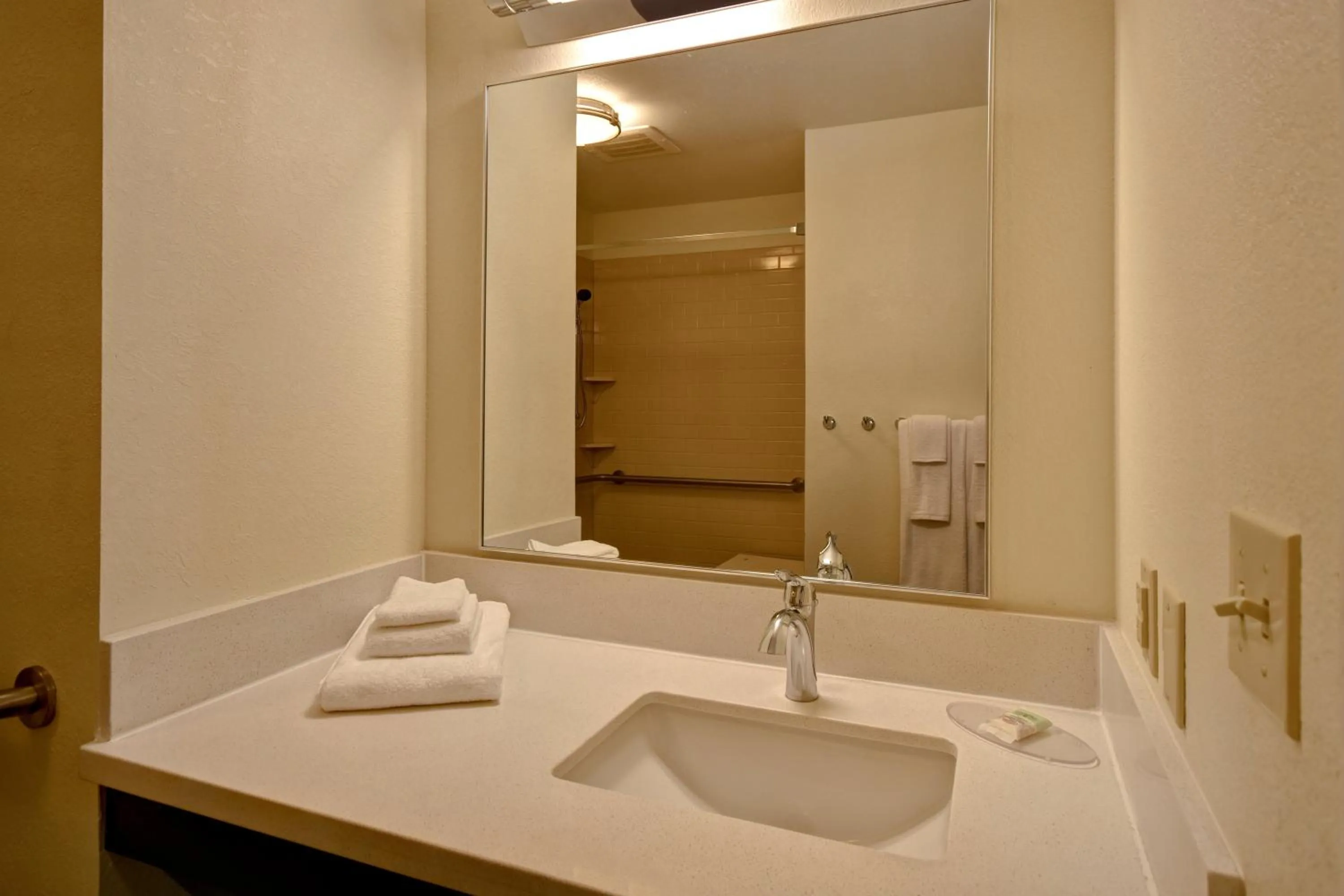 Bathroom in Candlewood Suites St Clairsville Wheeling Area by IHG