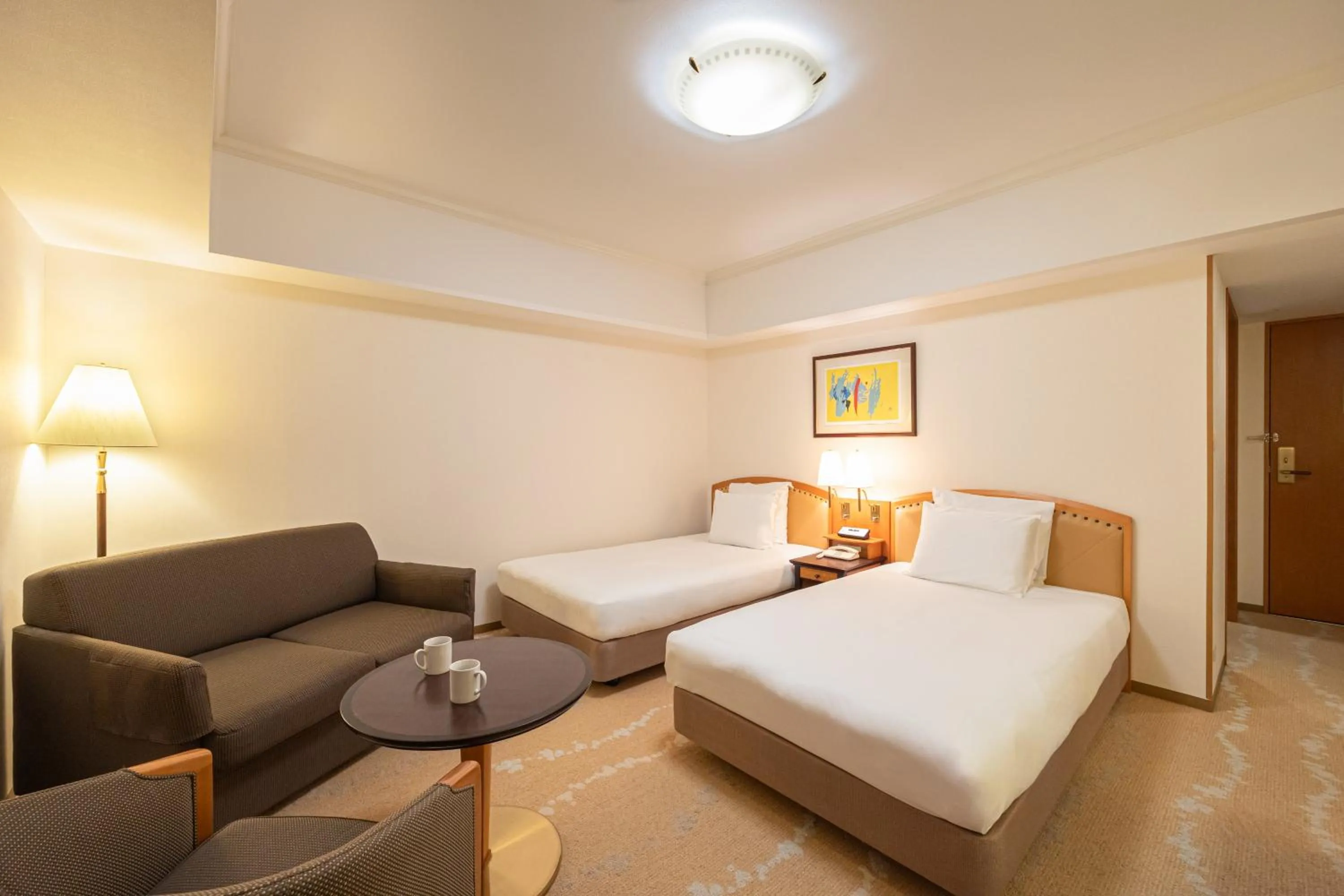 Photo of the whole room, Bed in ANA Crowne Plaza Toyama by IHG