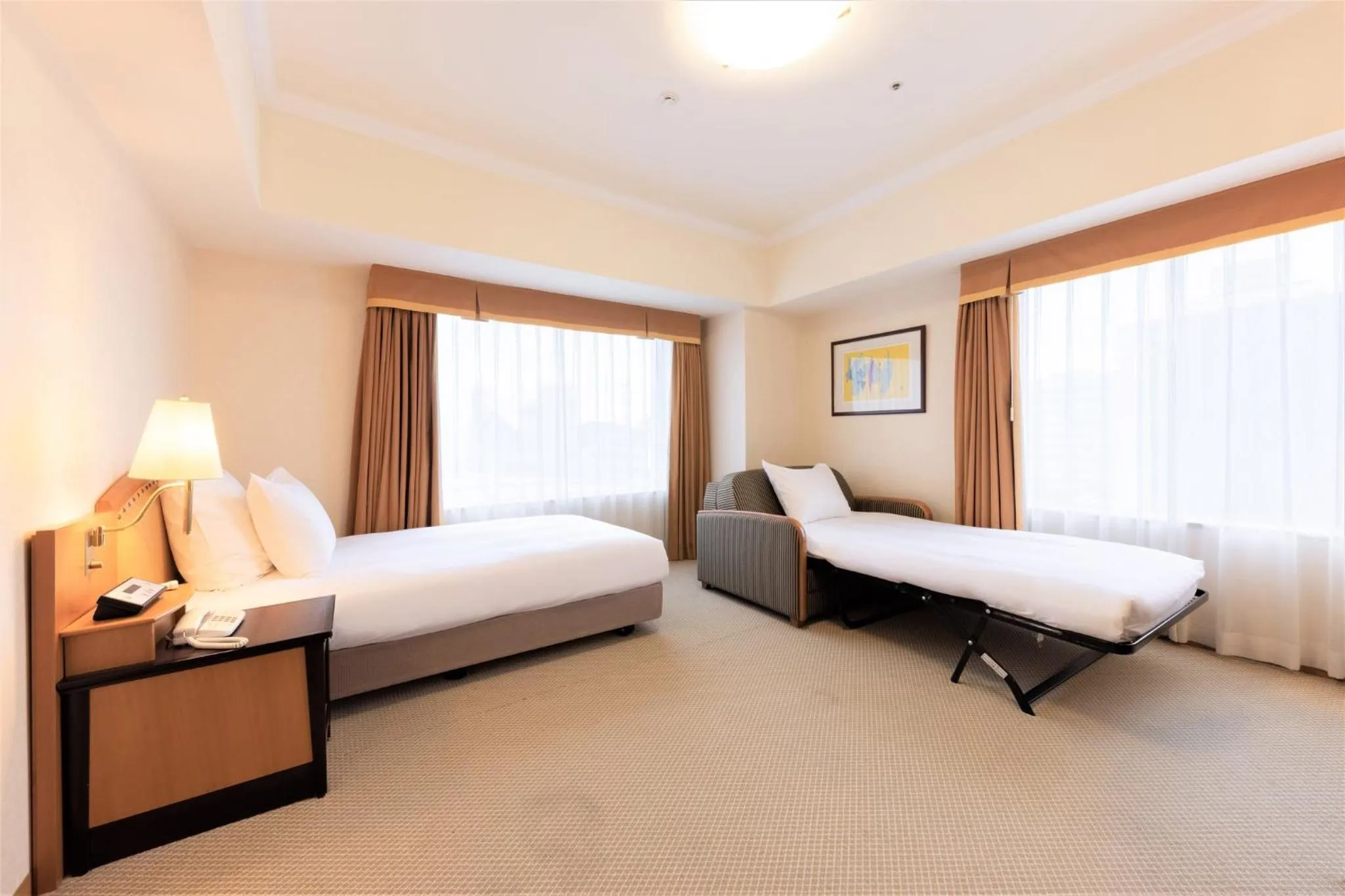 Photo of the whole room, Bed in ANA Crowne Plaza Toyama by IHG