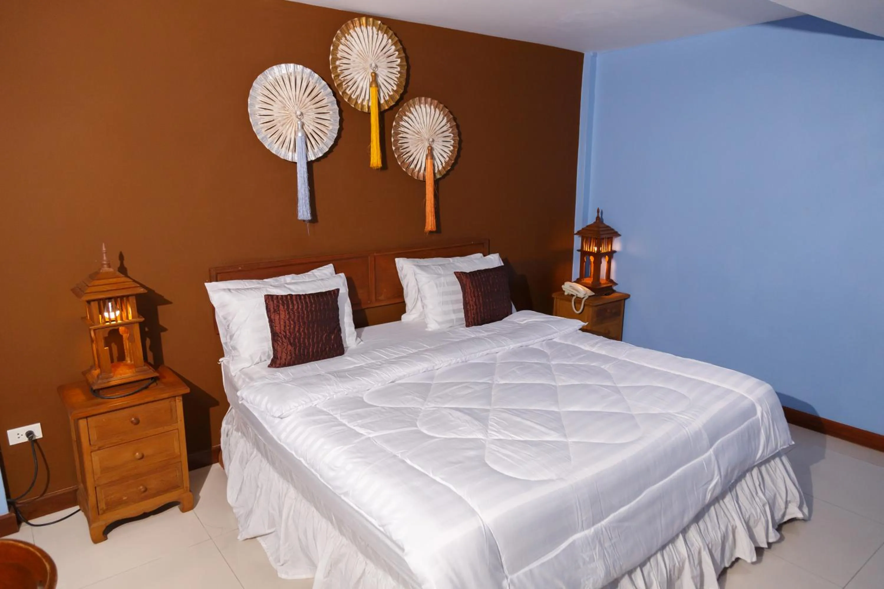 Bed in UPAR Hotels Silom