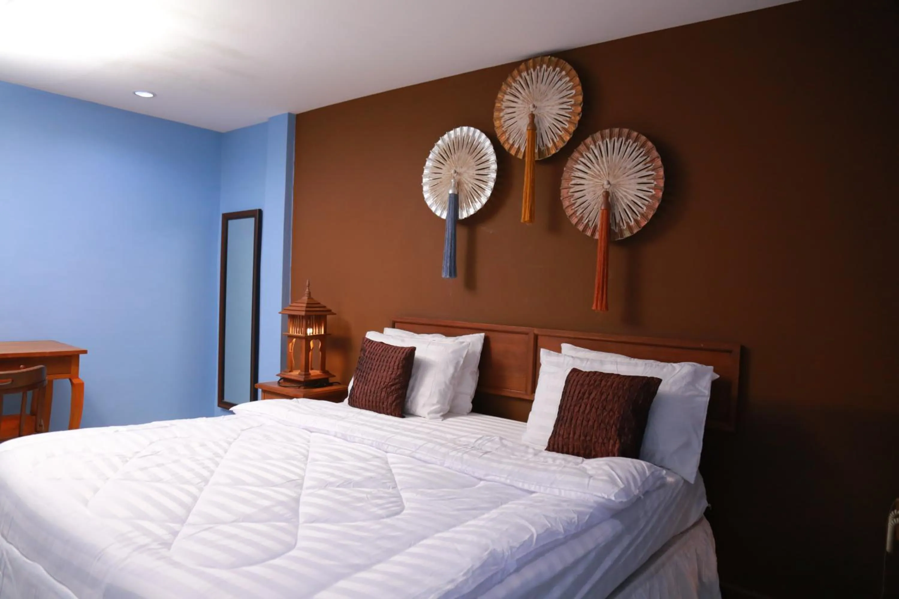 Bed in UPAR Hotels Silom