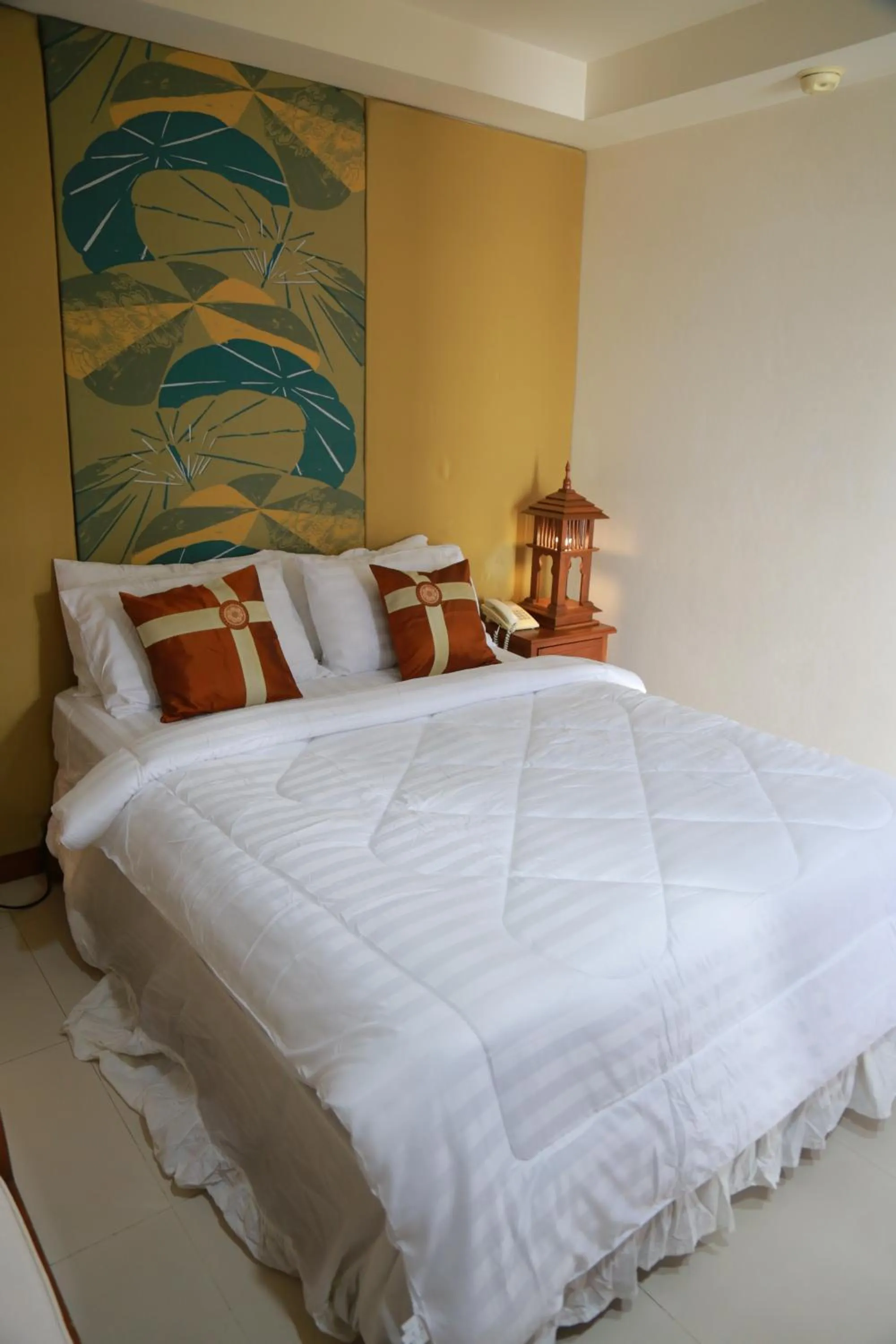 Bed in UPAR Hotels Silom