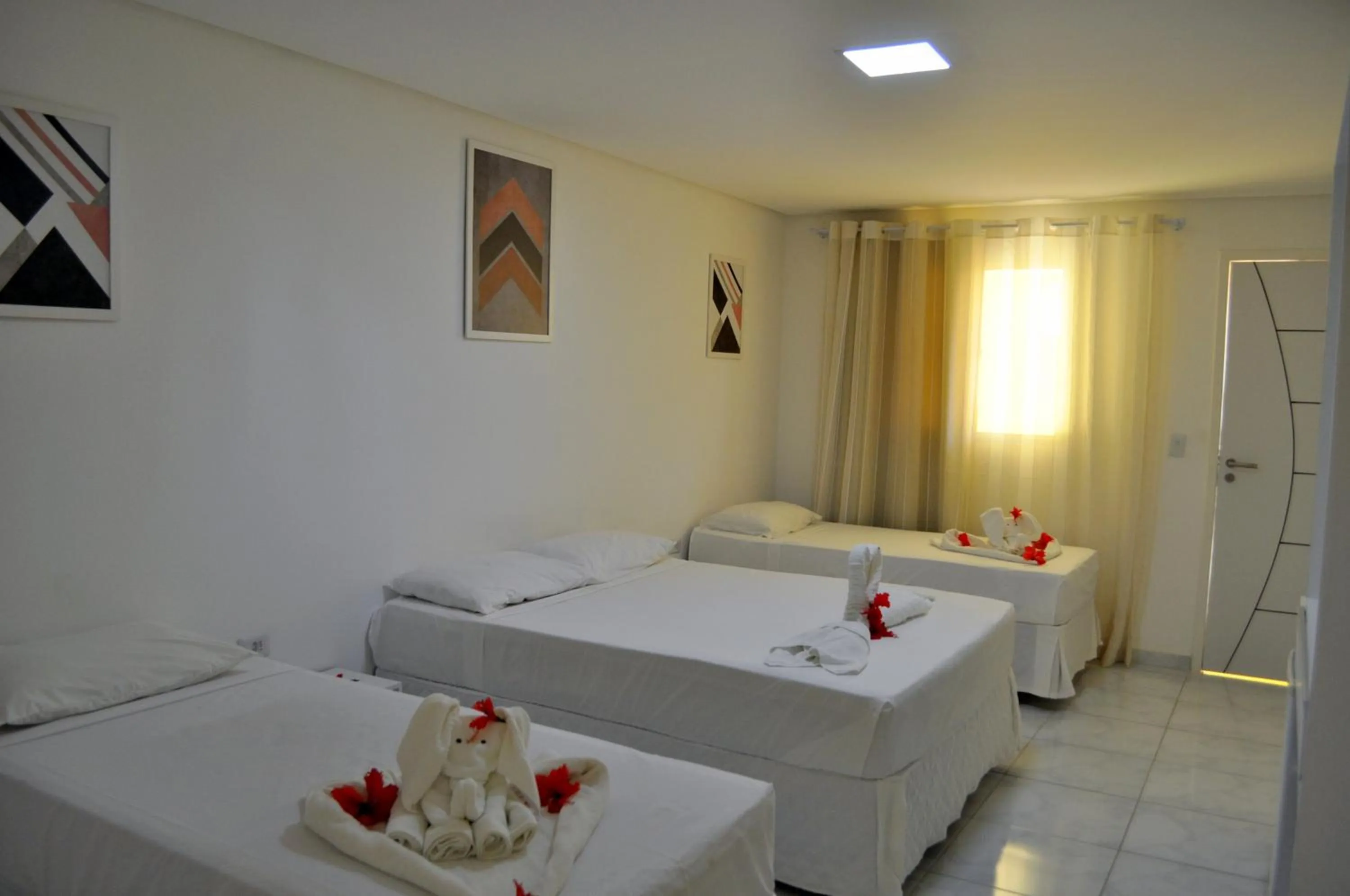 Bed in Pousada Joia Rara