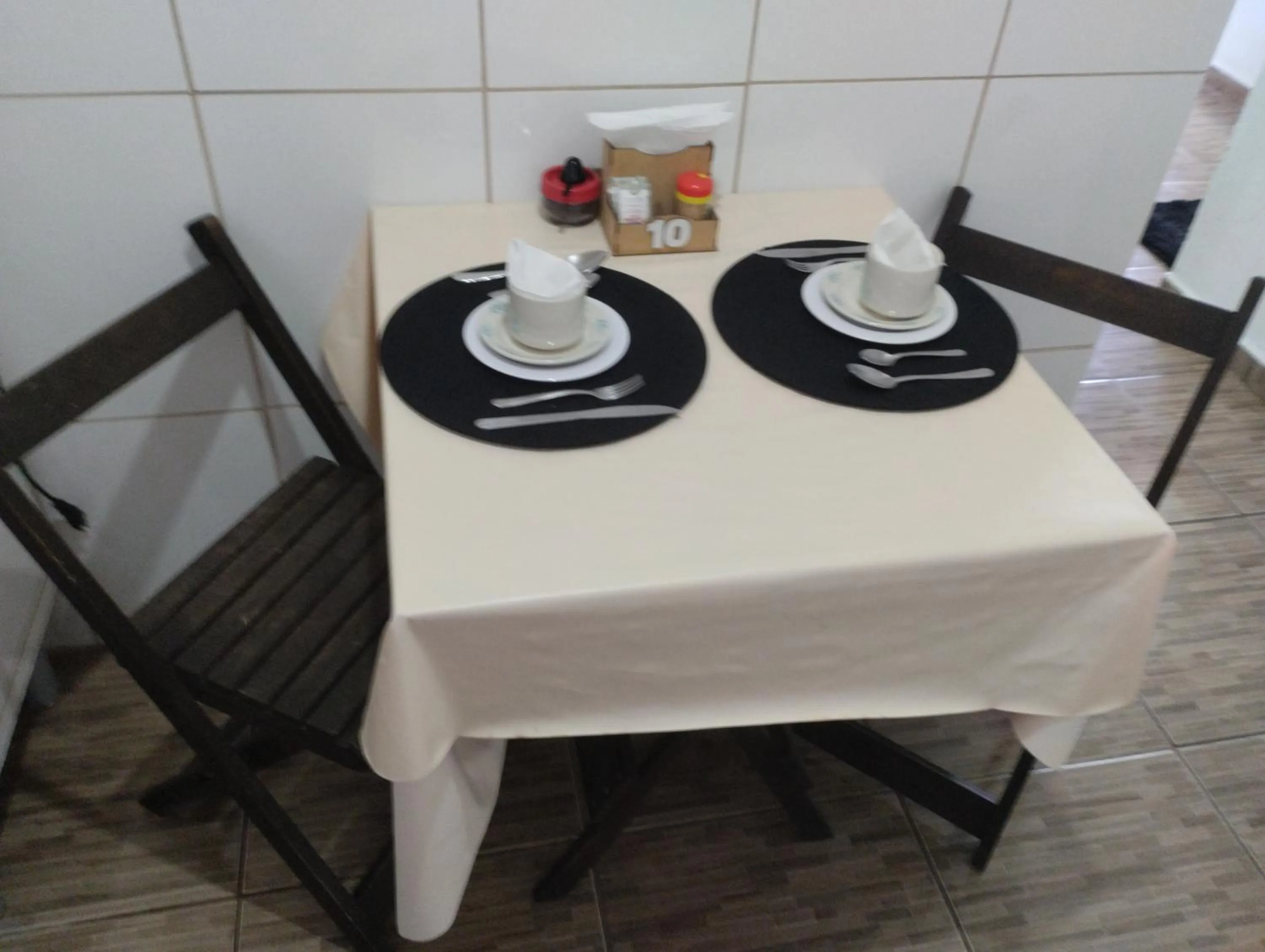 Dining area in Pousada Cantinho da Mi & Teco