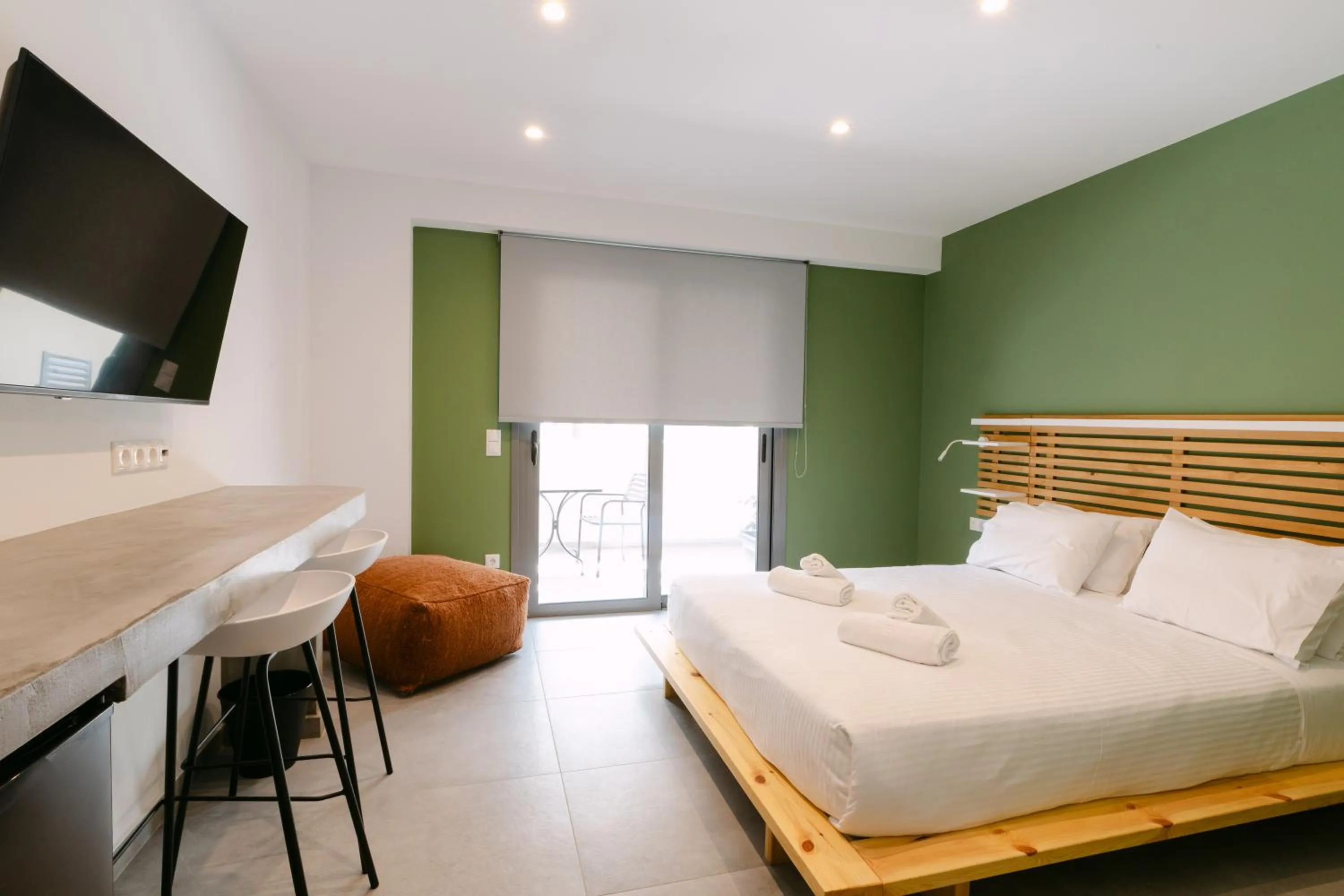 Photo of the whole room, Bed in 11 Reasons Why Metaxourgeio