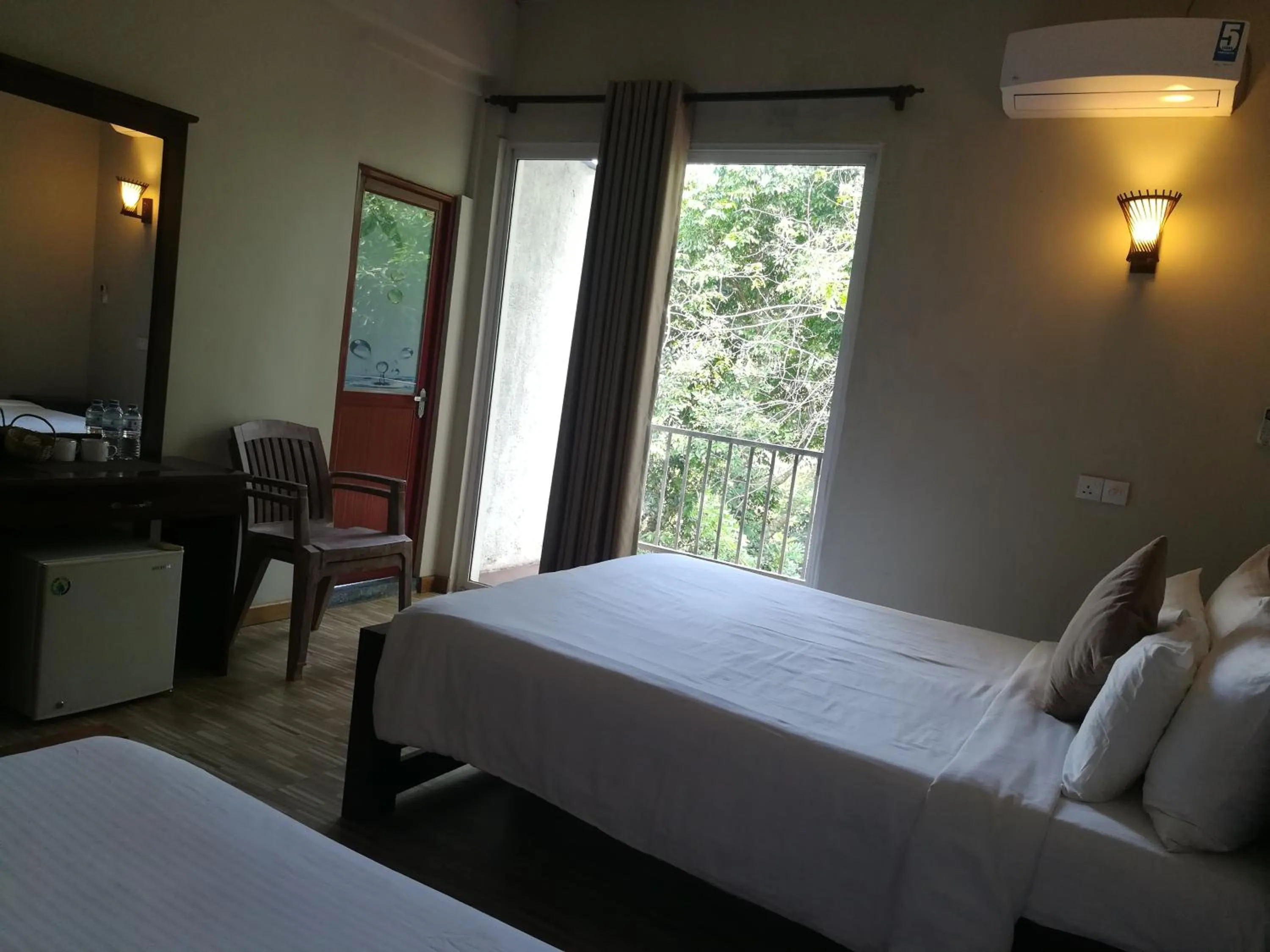 Bed in Villa Arunalu Kandy