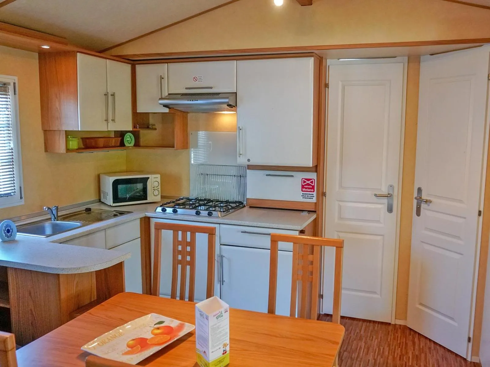 Kitchen or kitchenette in Portofelice Camping Village