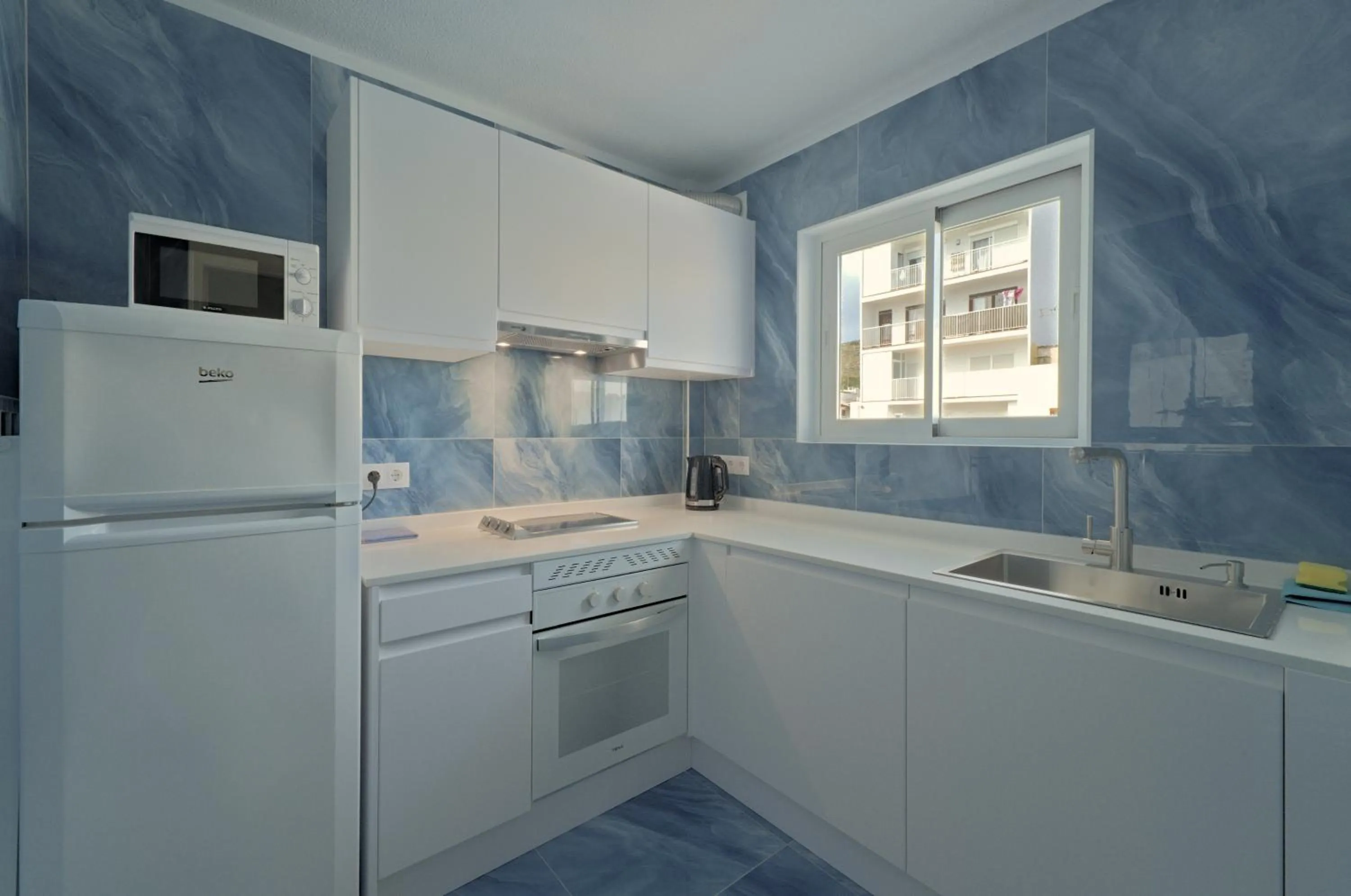 kitchen in All Suite Ibiza Aparthotel