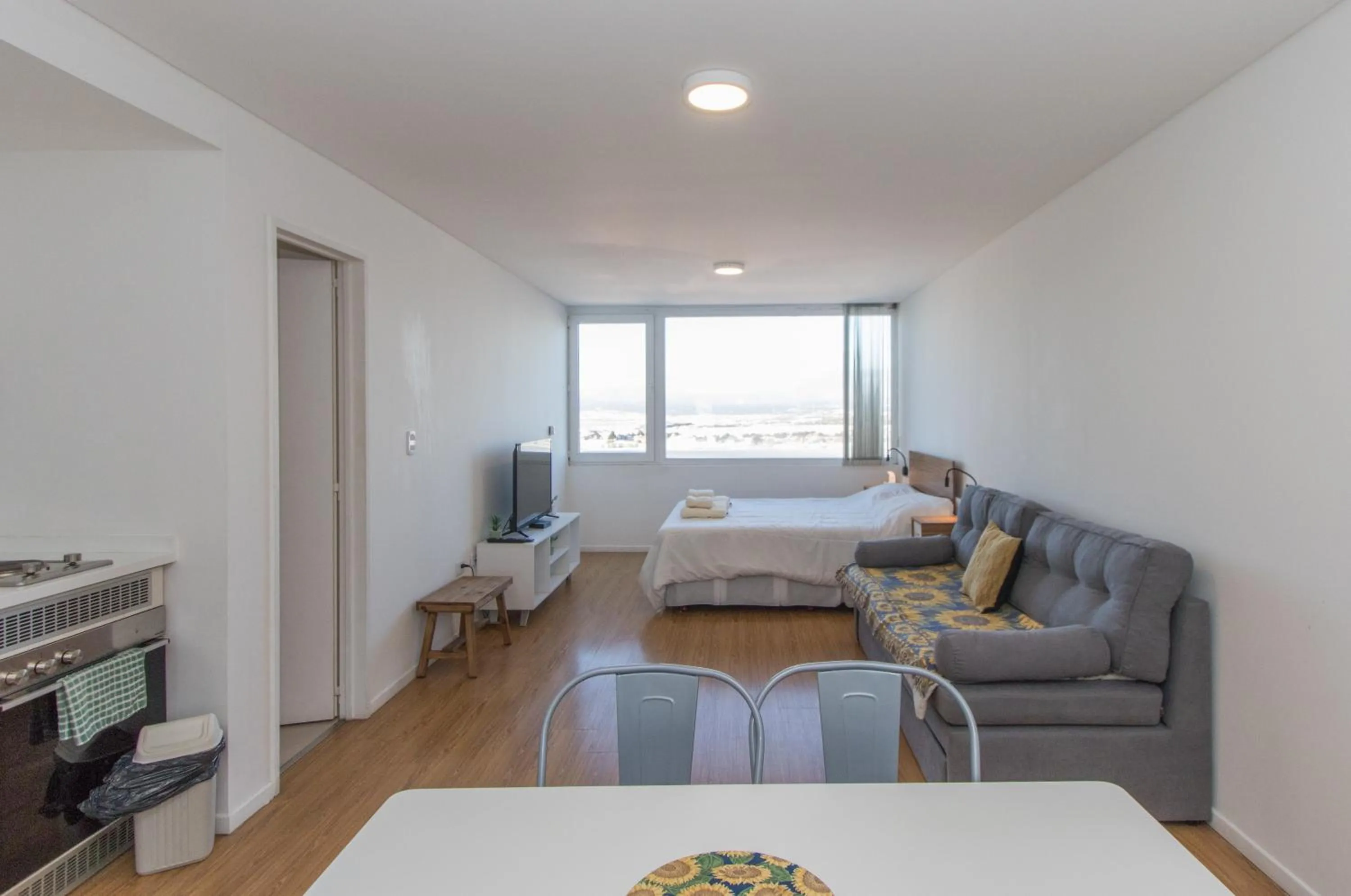 Living room, Bed in Pacifico Apartamentos