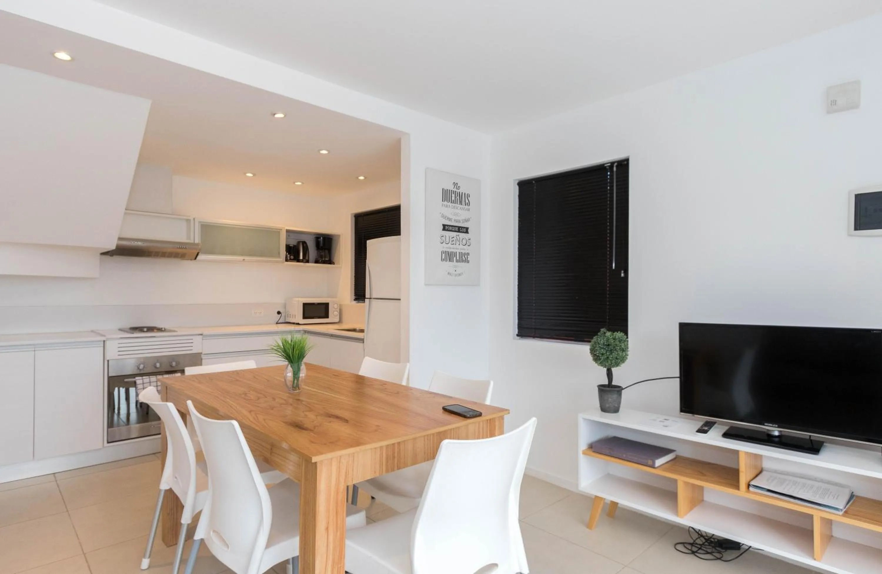 Kitchen or kitchenette in Pacifico Apartamentos