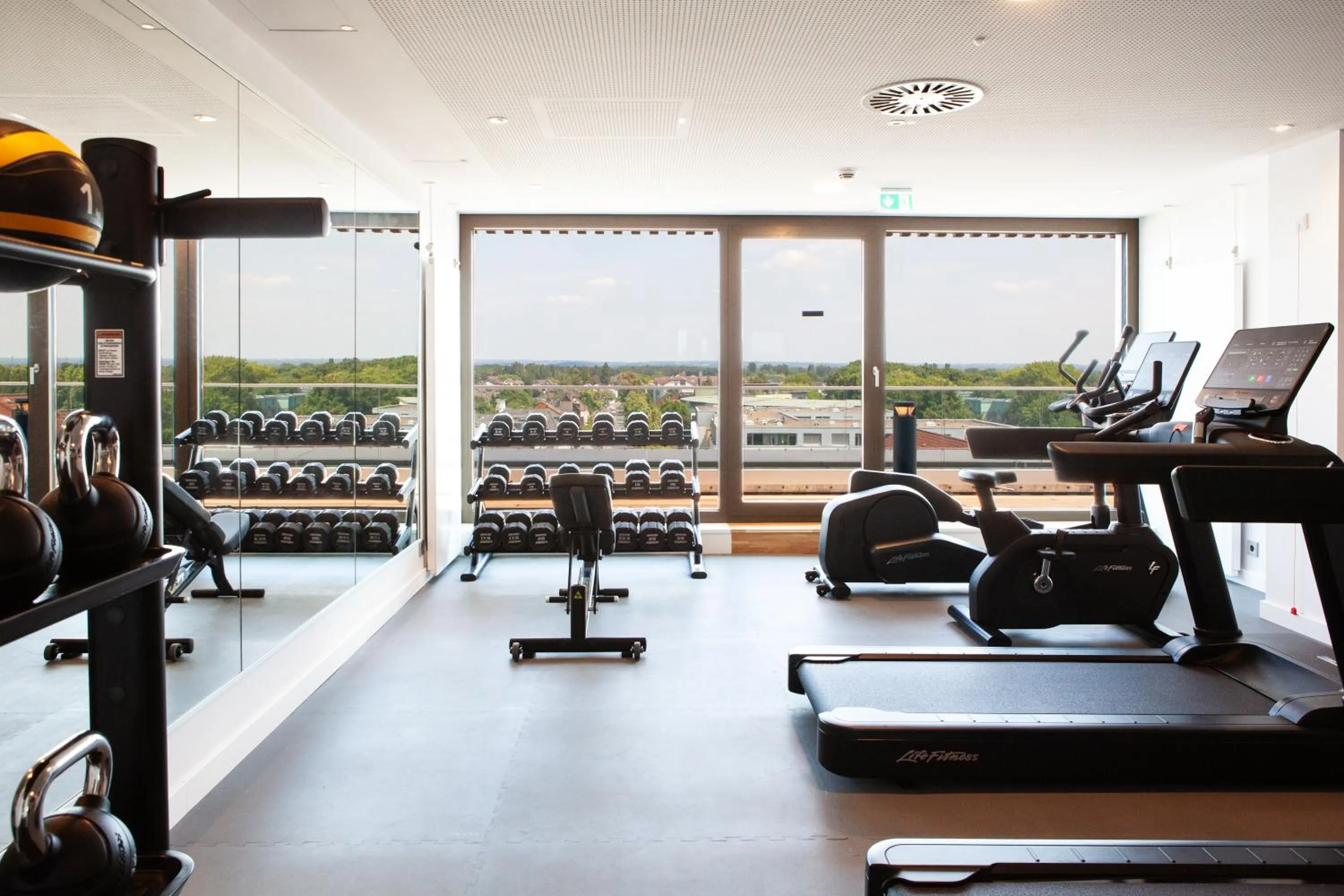Fitness centre/facilities in Holiday Inn Express & Suites Monheim am Rhein by IHG