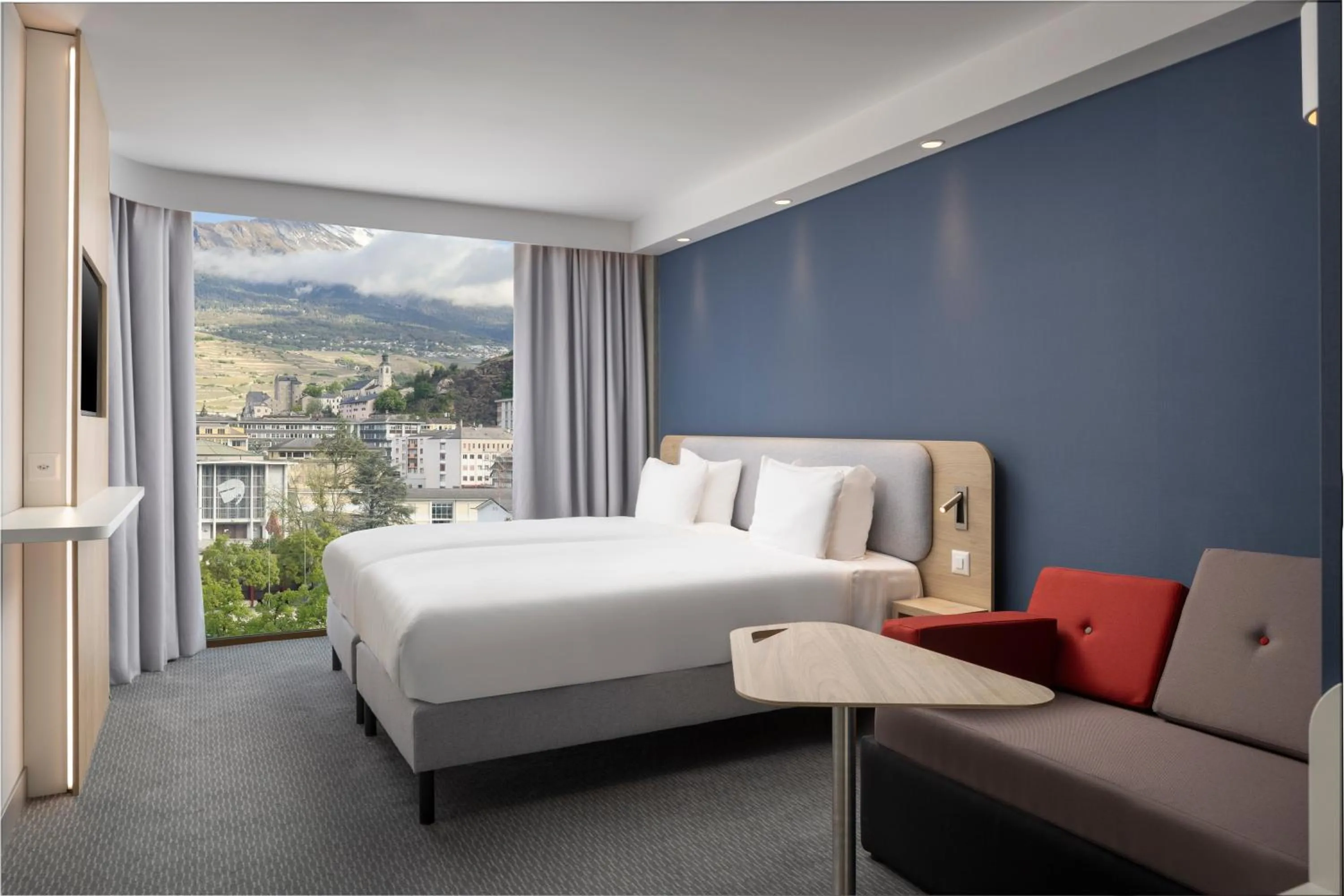 Bed in Holiday Inn Express & Suites Sion by IHG