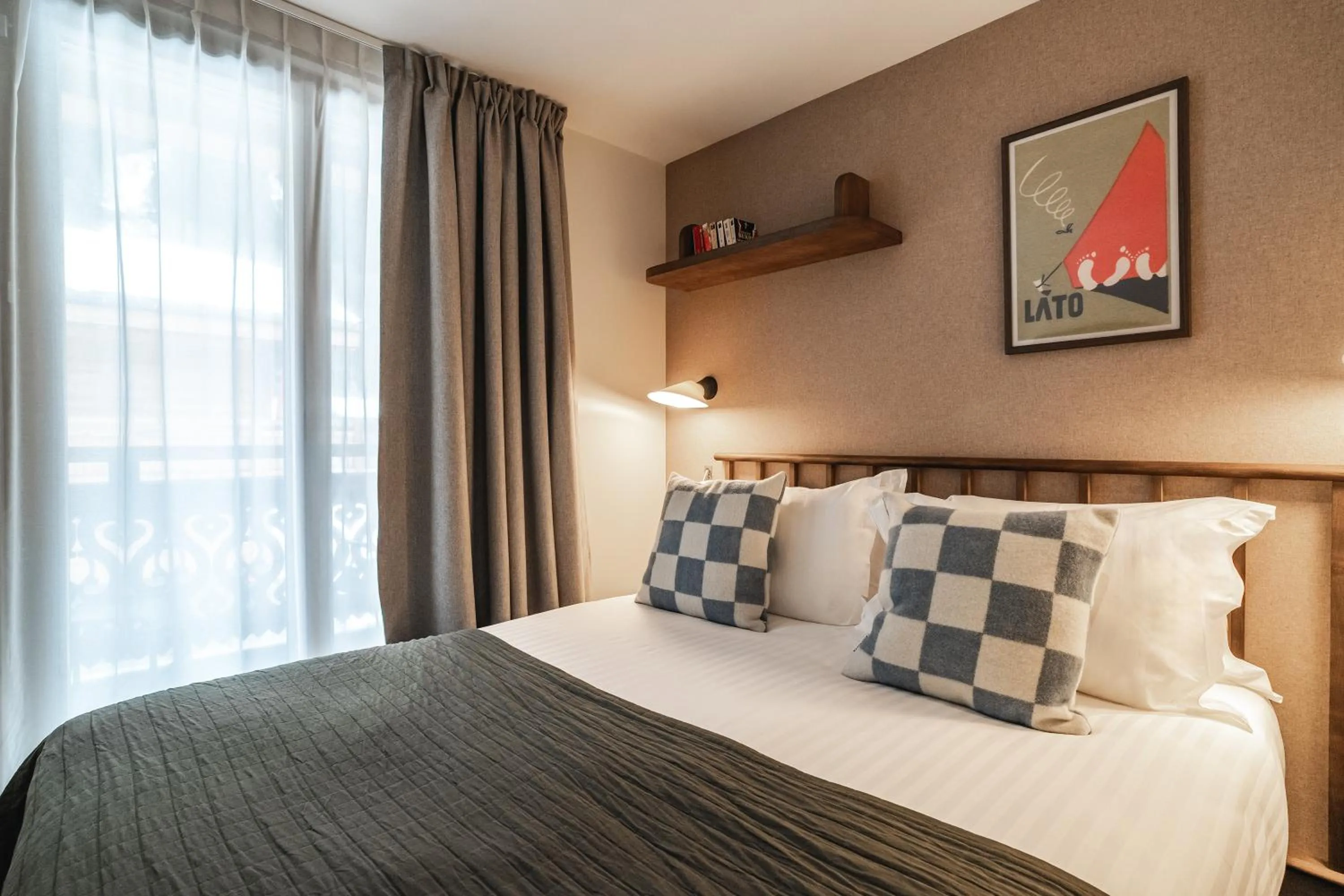 Bed in Appartements de l'Héliopic