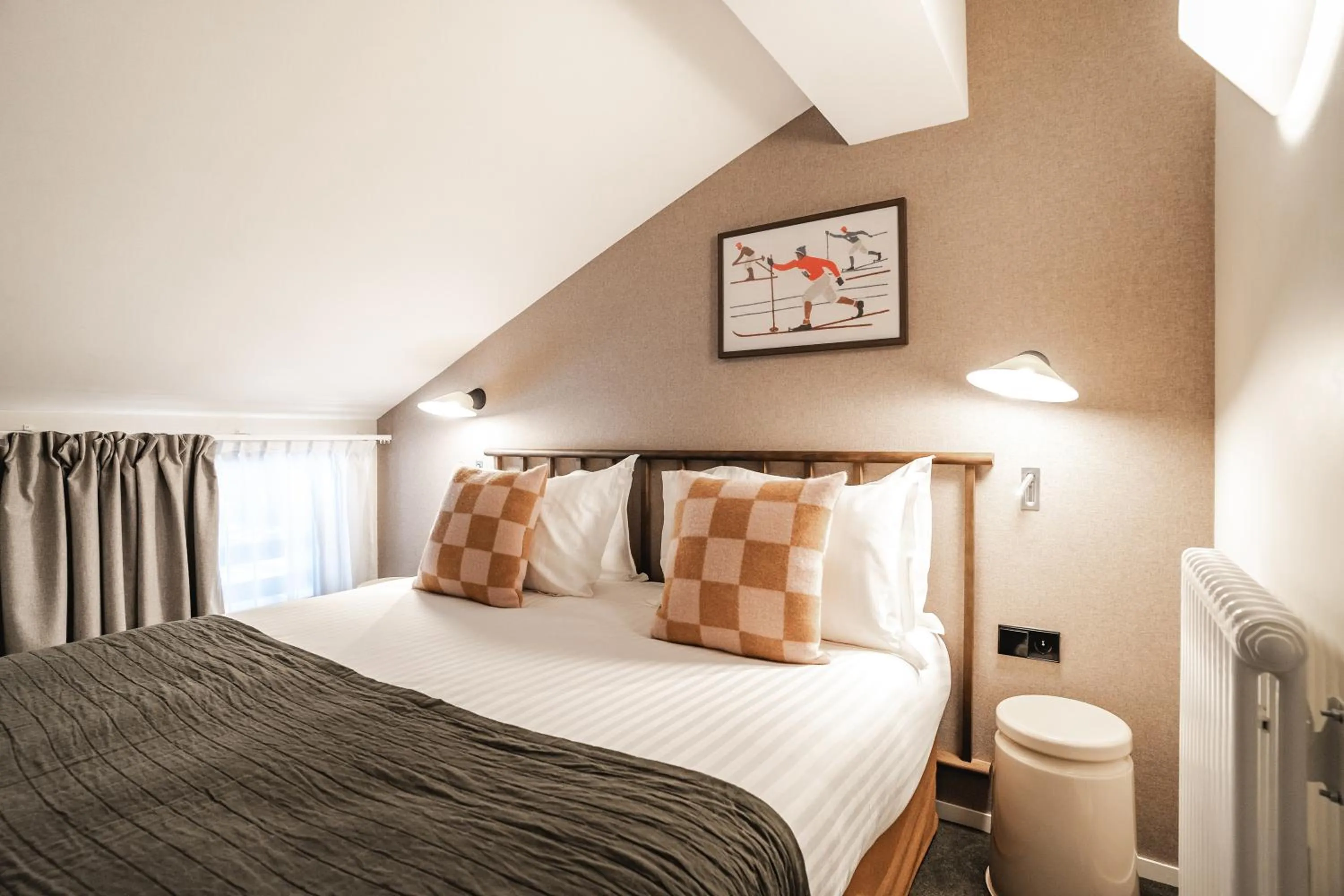 Bed in Appartements de l'Héliopic