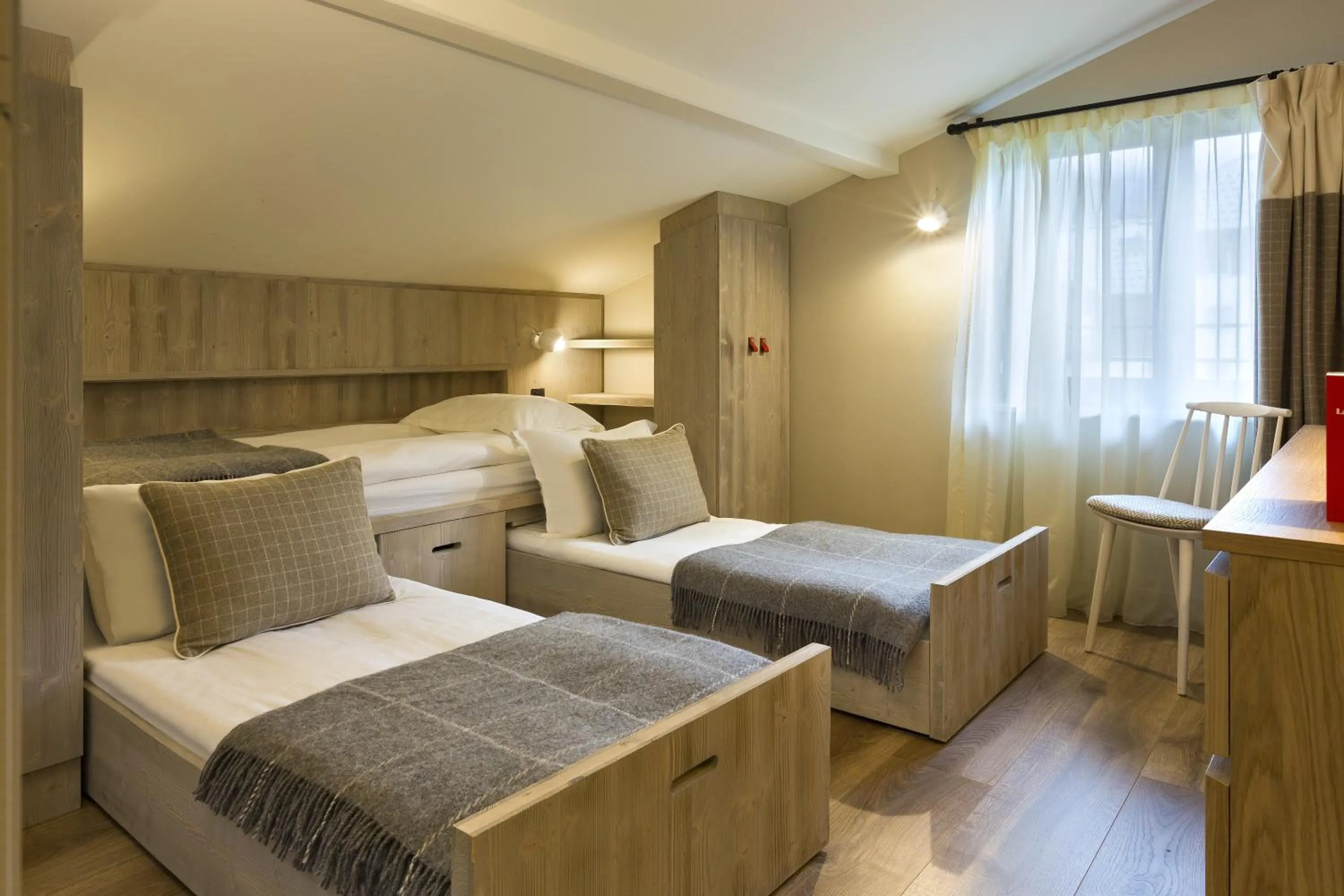 Bed in Appartements de l'Héliopic