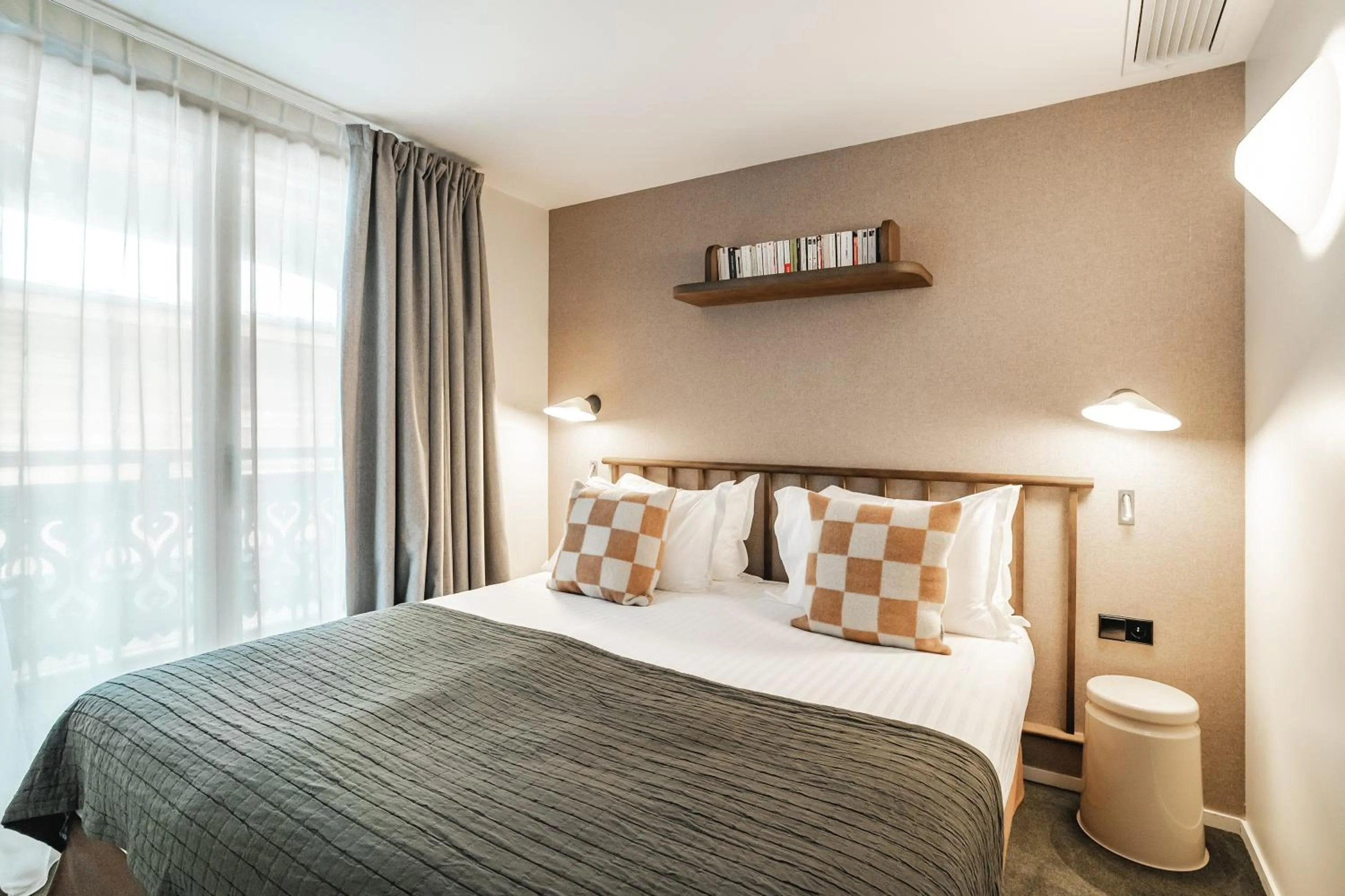 Bed in Appartements de l'Héliopic