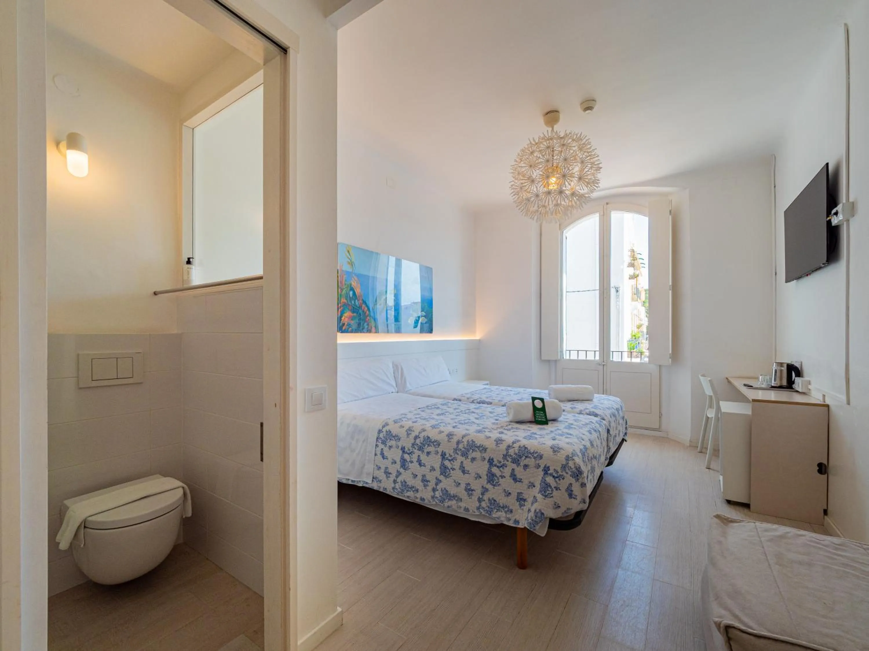 Shower, Bed in Hostal Marina Cadaqués