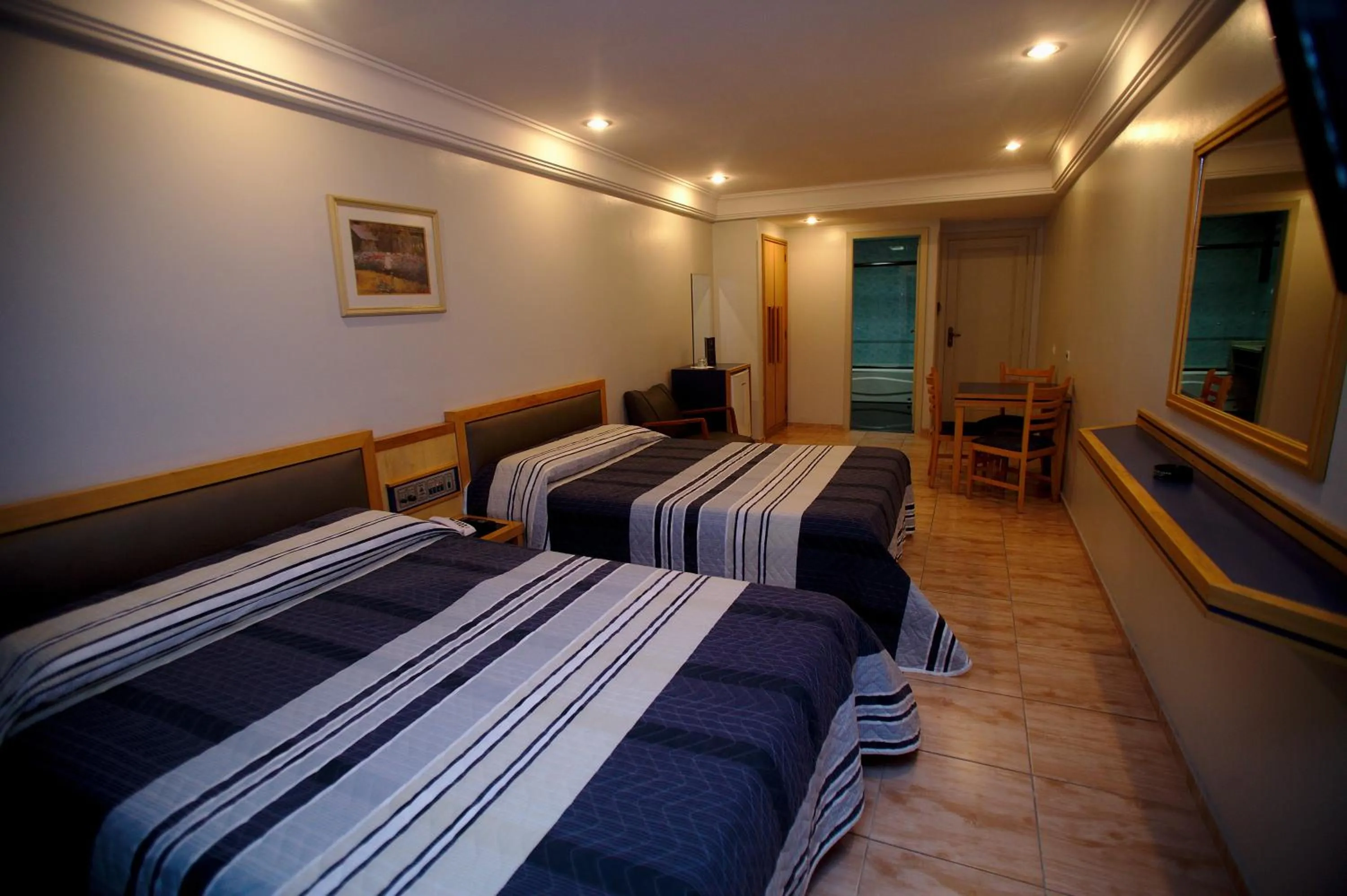 Bed in Hotel Columbia