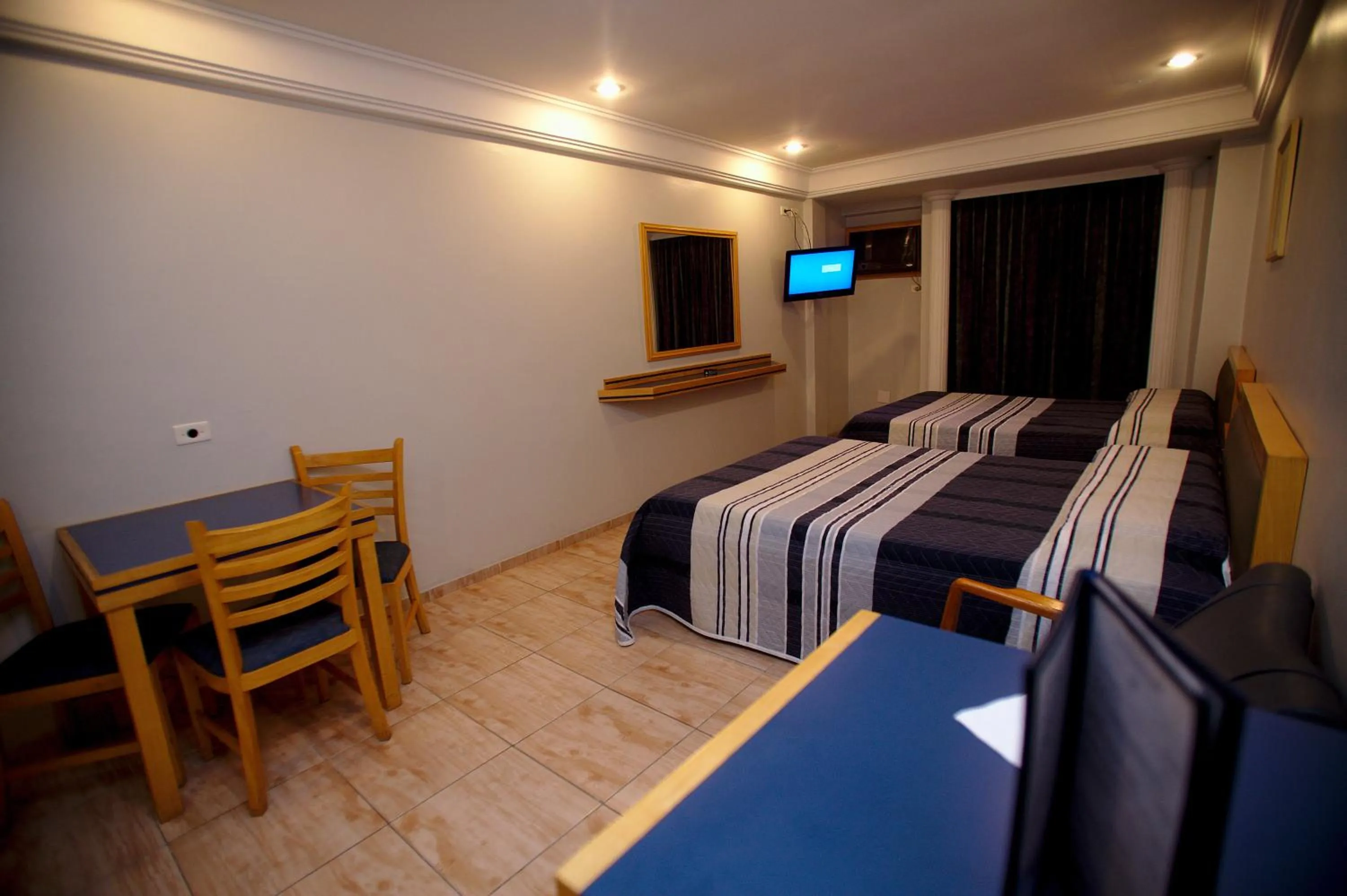 Bed in Hotel Columbia