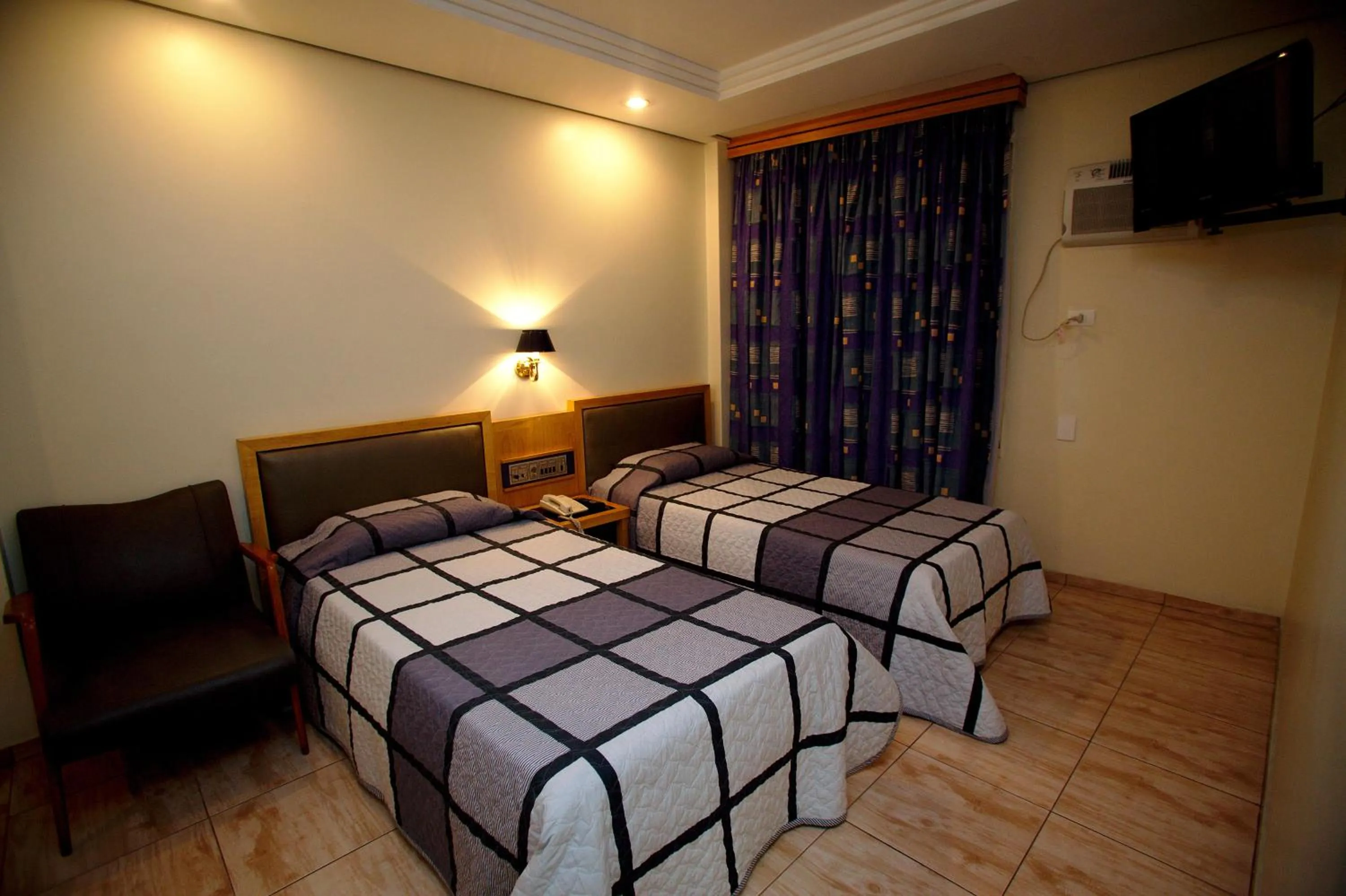 Bed in Hotel Columbia