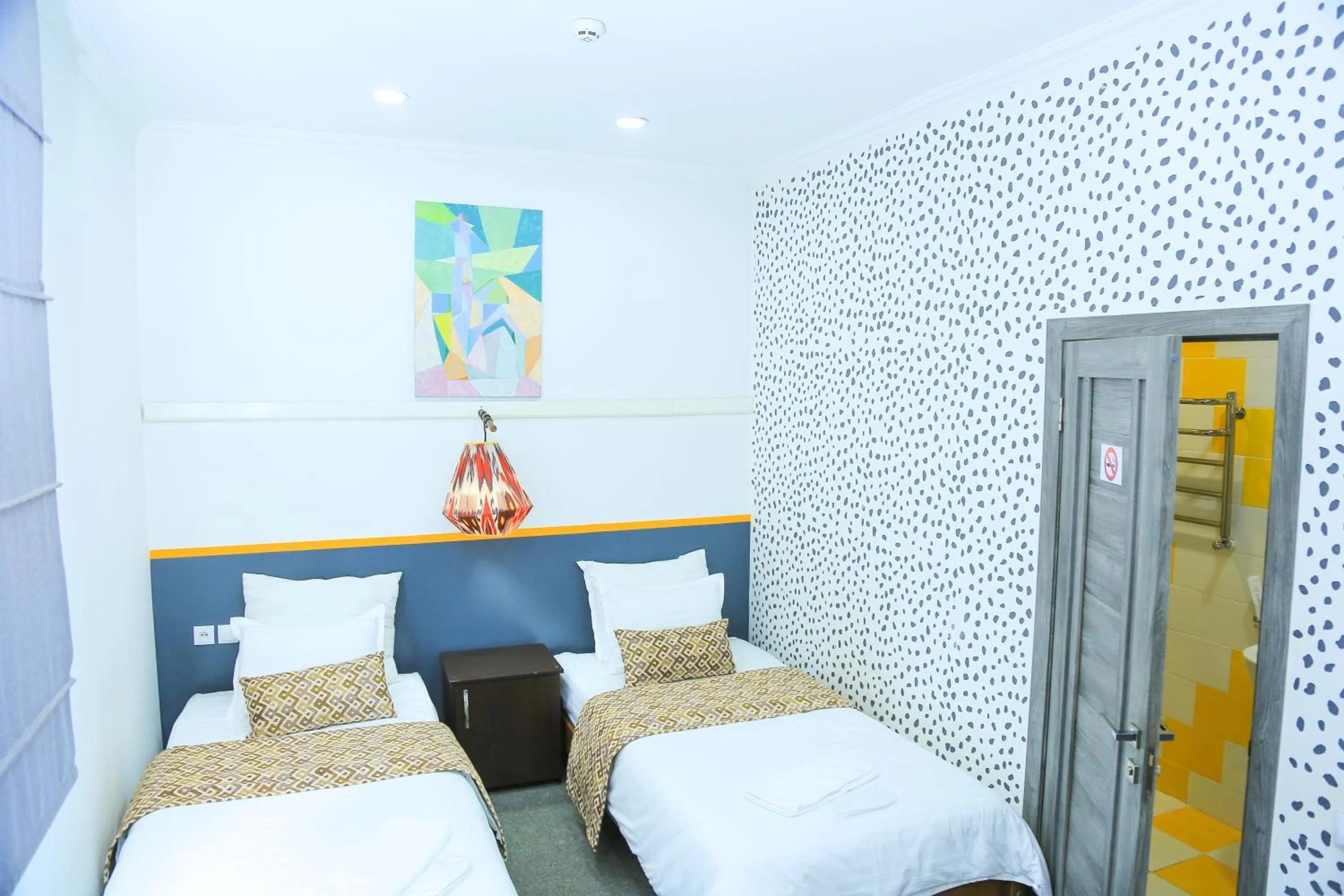 Bed in ART SAMARQAND hotel