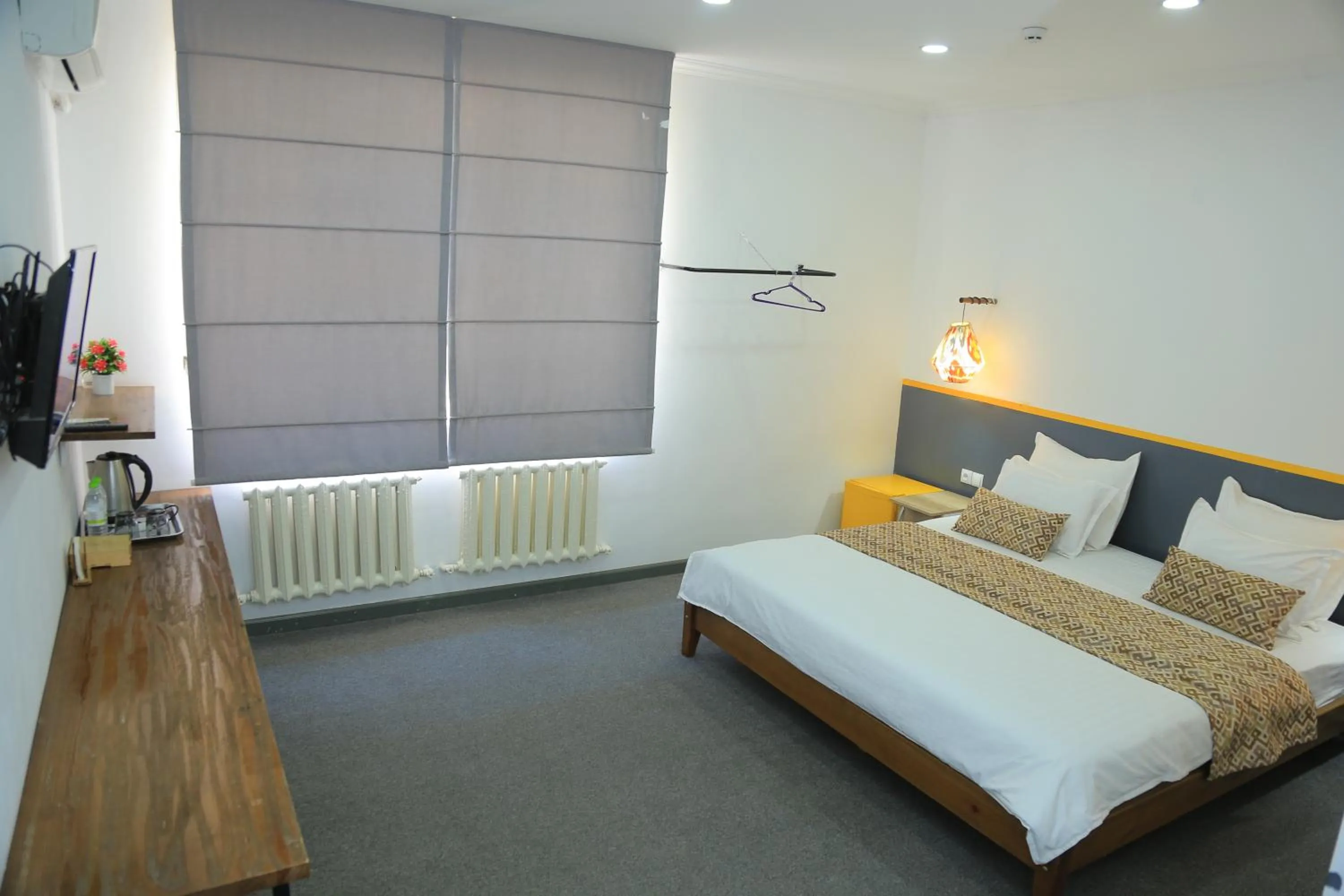 Bed in ART SAMARQAND hotel