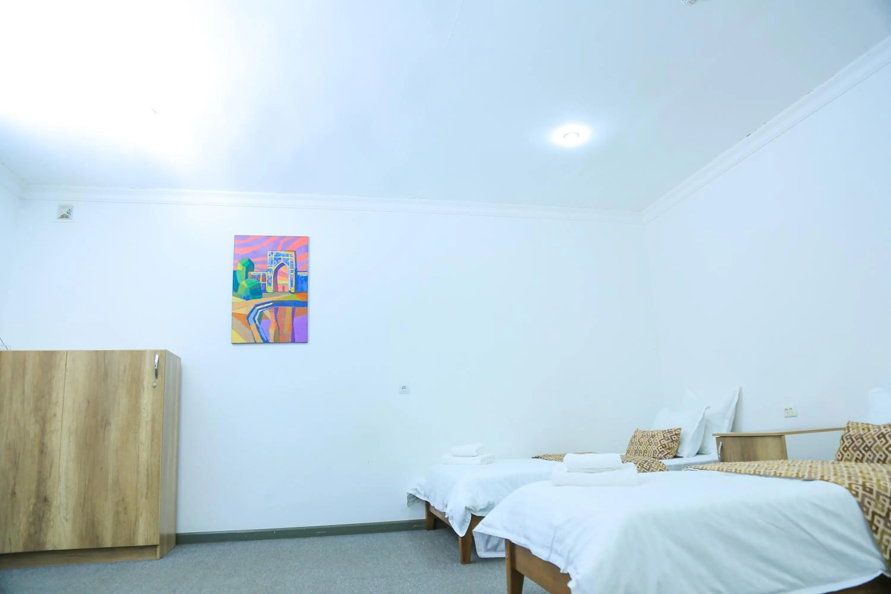 Bed in ART SAMARQAND hotel