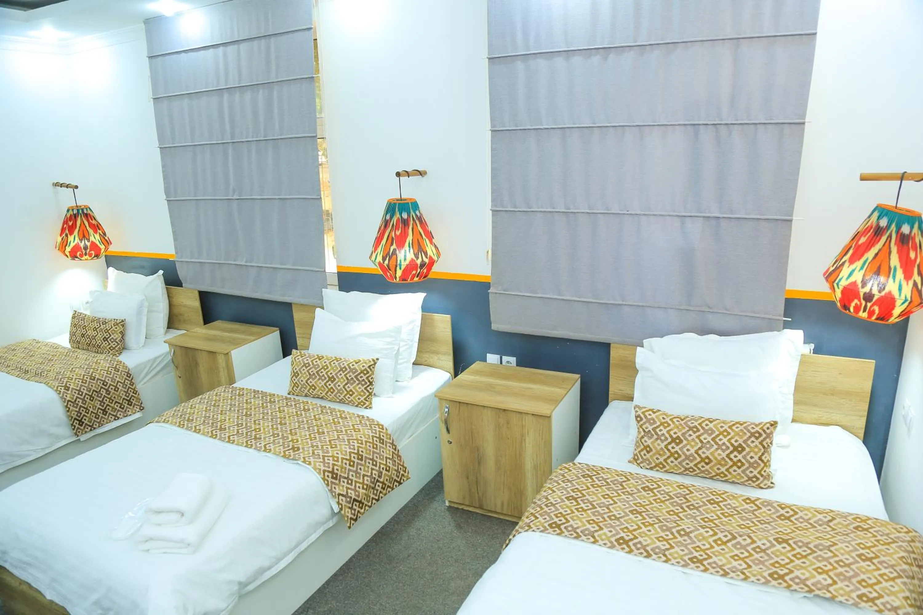 Bed in ART SAMARQAND hotel