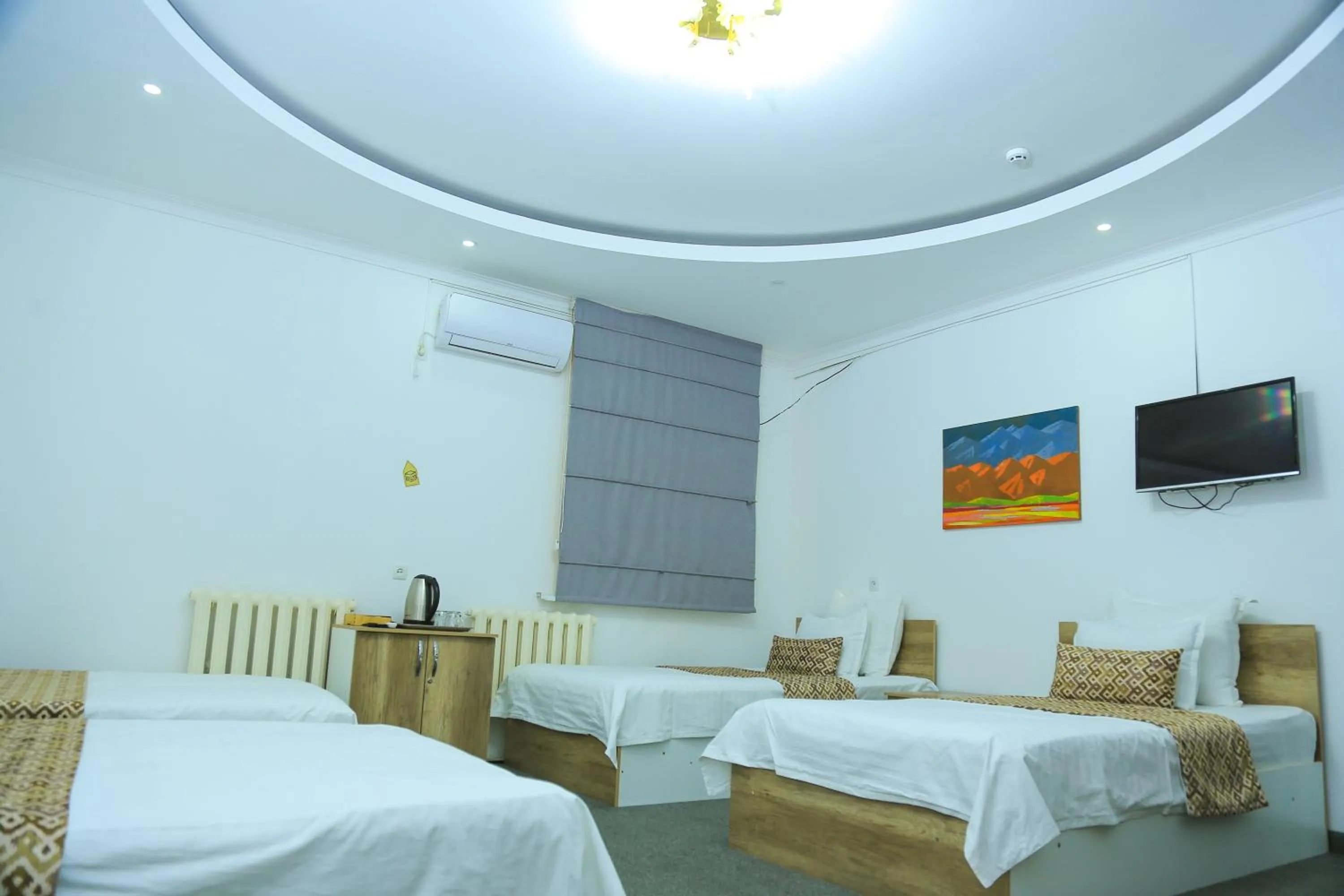 Bed in ART SAMARQAND hotel