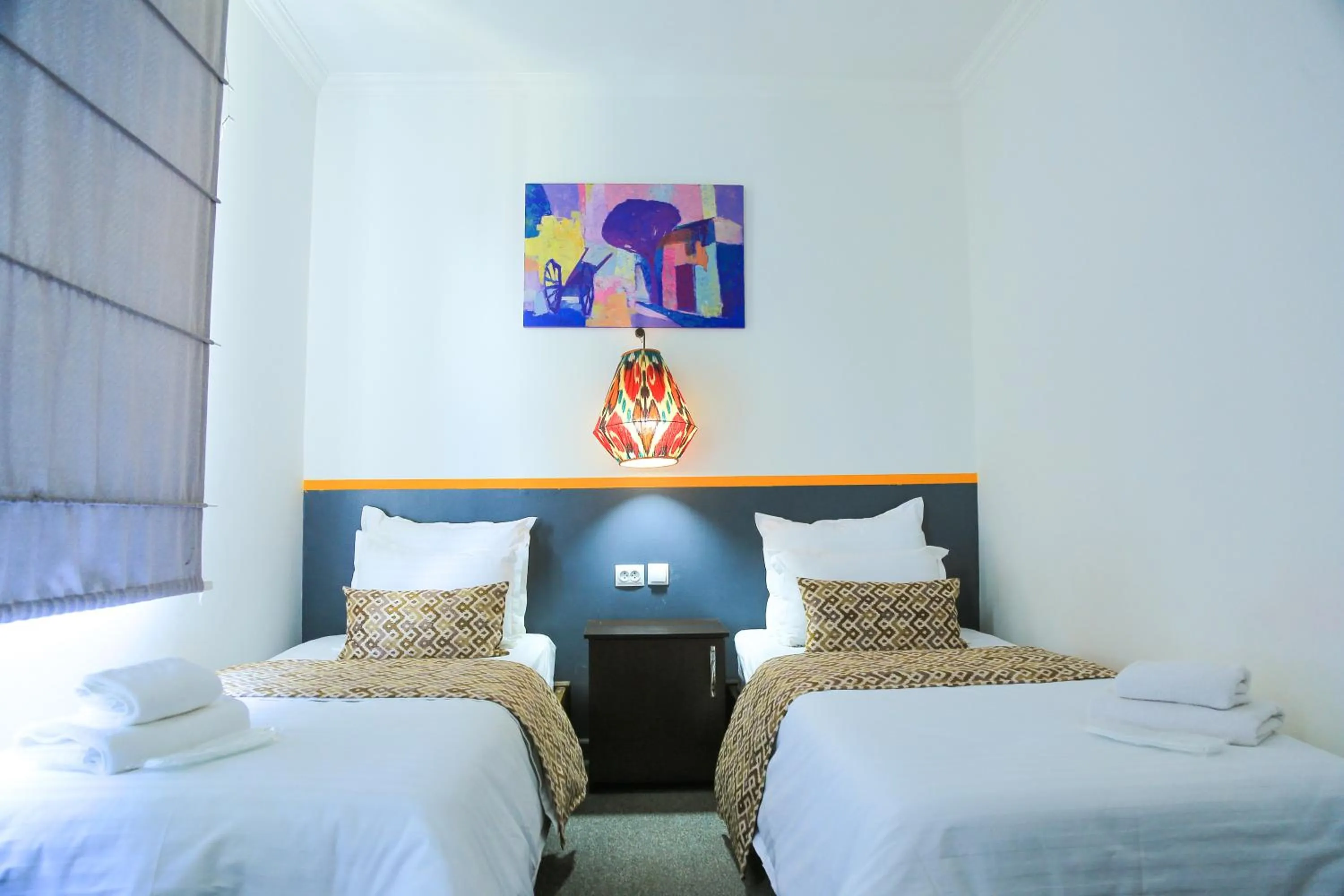 Bed in ART SAMARQAND hotel