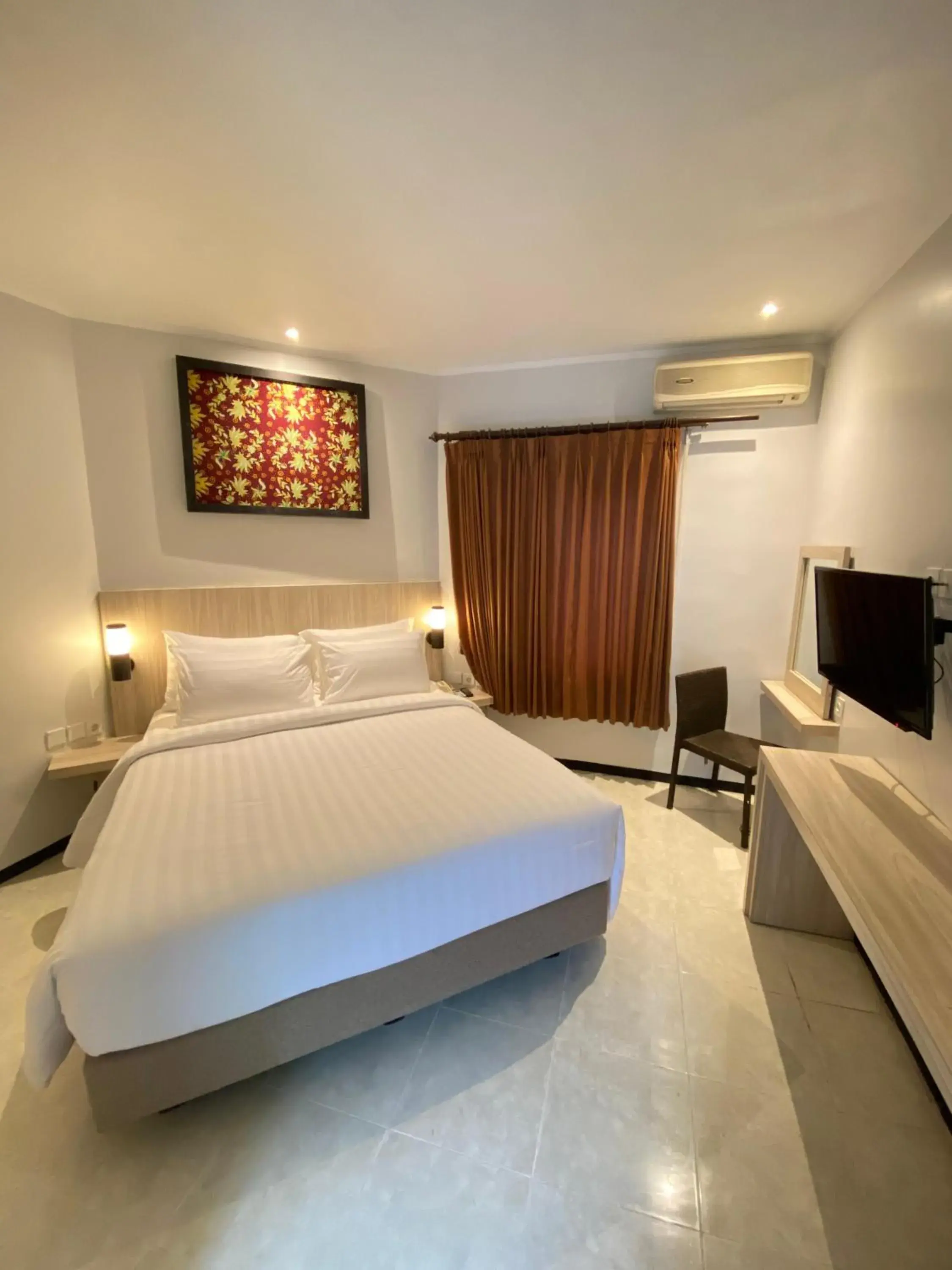 King Room in Tuwuh Hotel at Kayutangan King Room in Tuwuh Hotel at Kayutangan