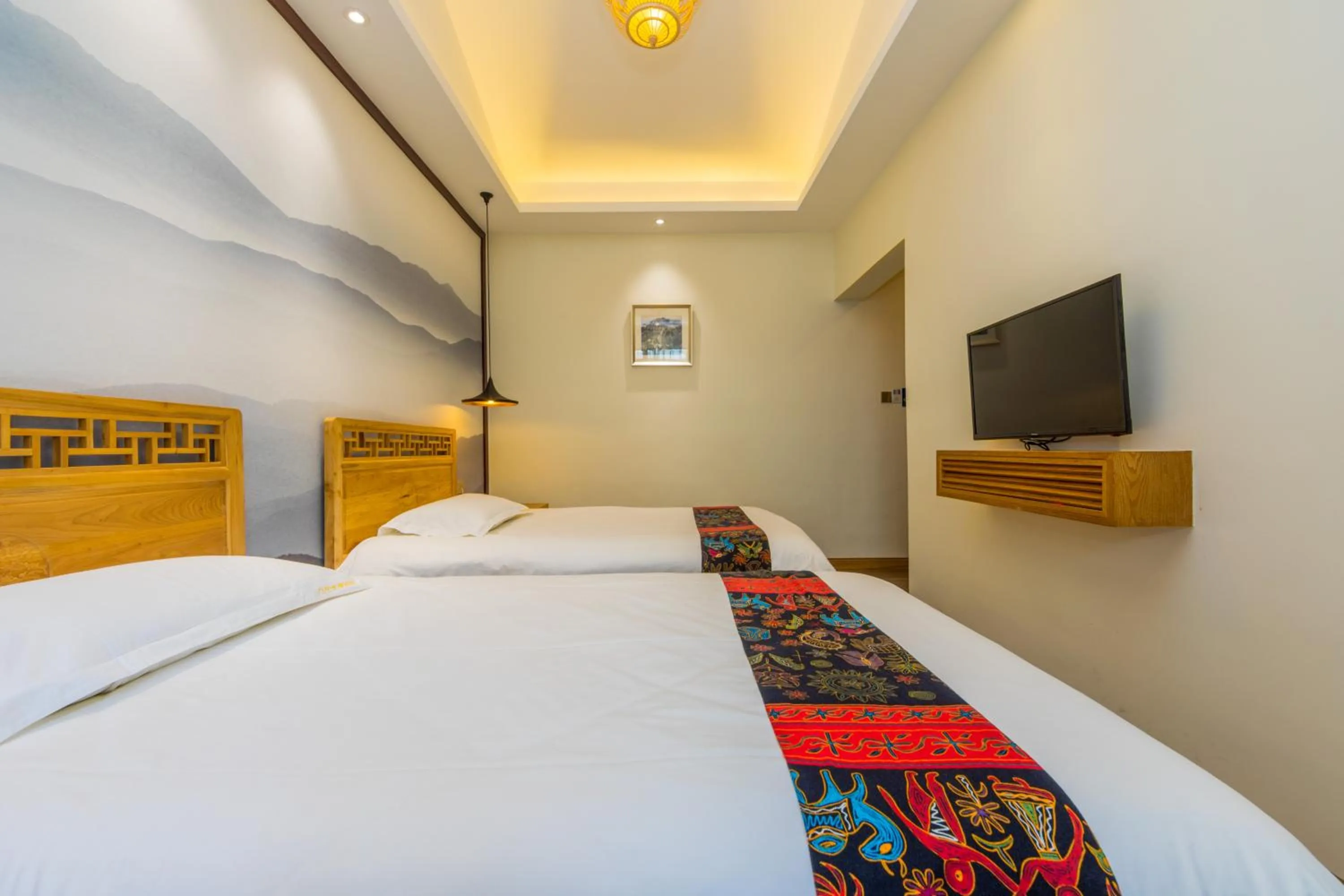 Photo of the whole room, Bed in Riverside Inn Guilin Central