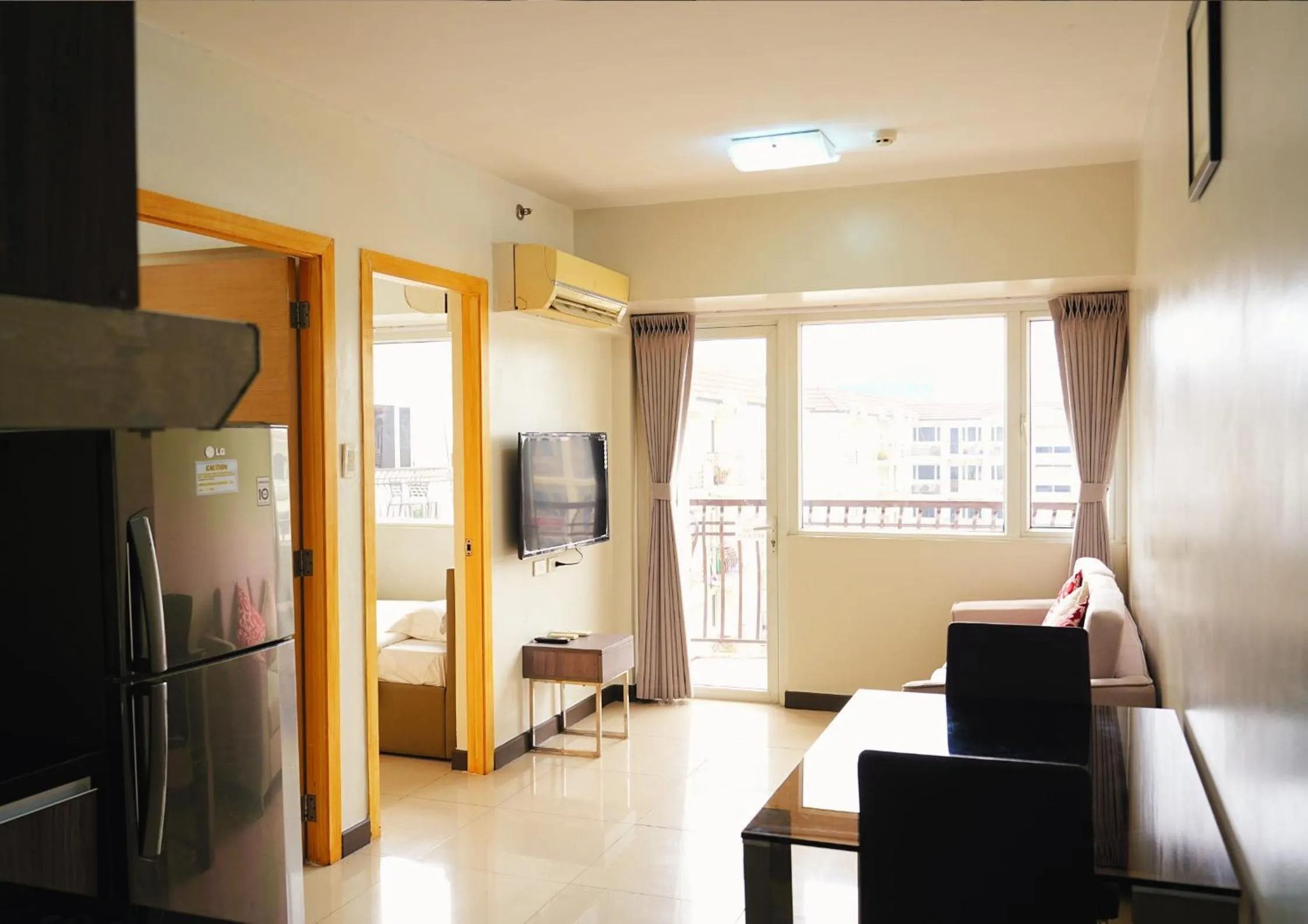 Living room, Bed in Extremeli Suites