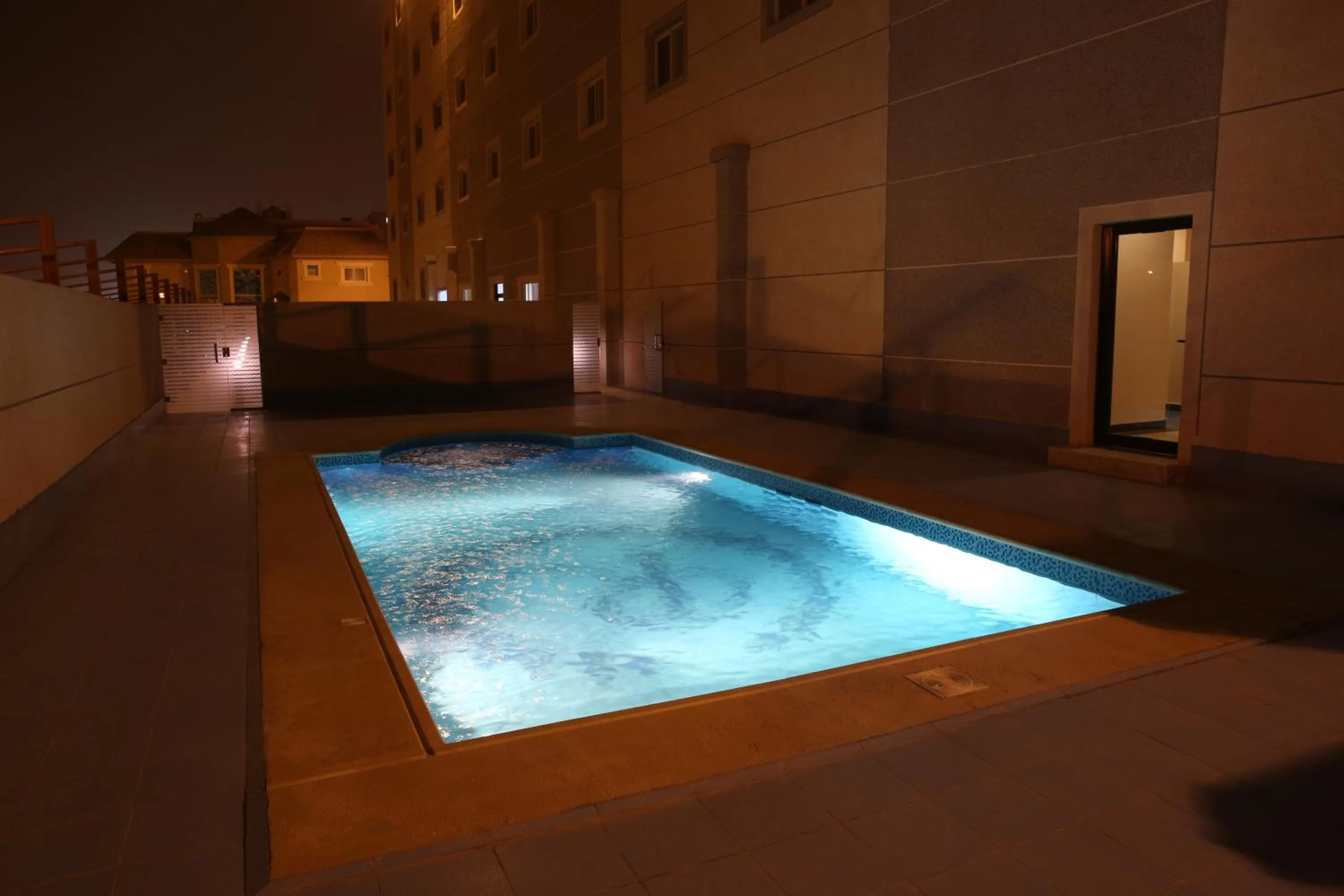 Swimming pool in Raoum Inn Hotel Apartments - Buraydah