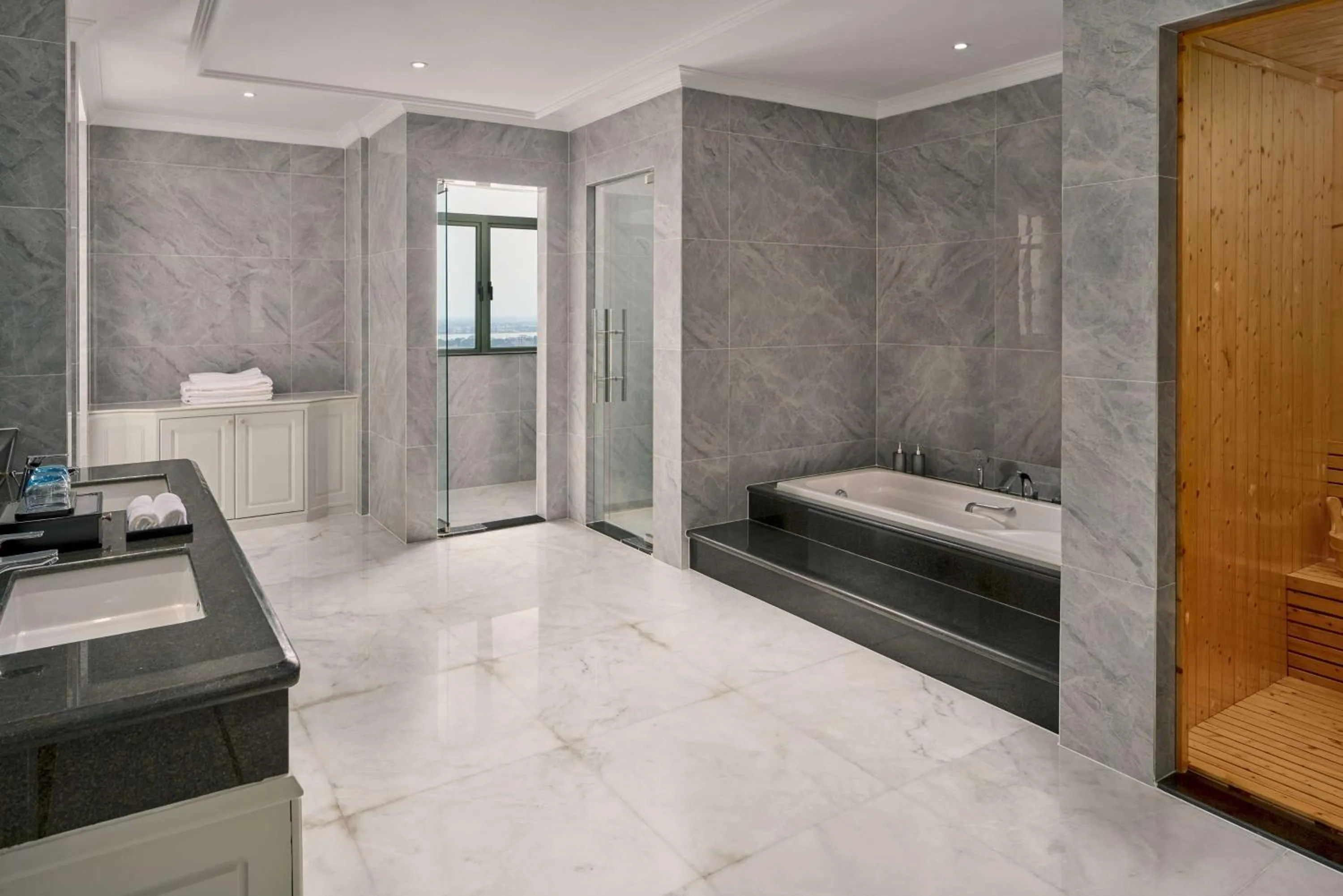 Bathroom, Bed in Wyndham Grand Phnom Penh Capital