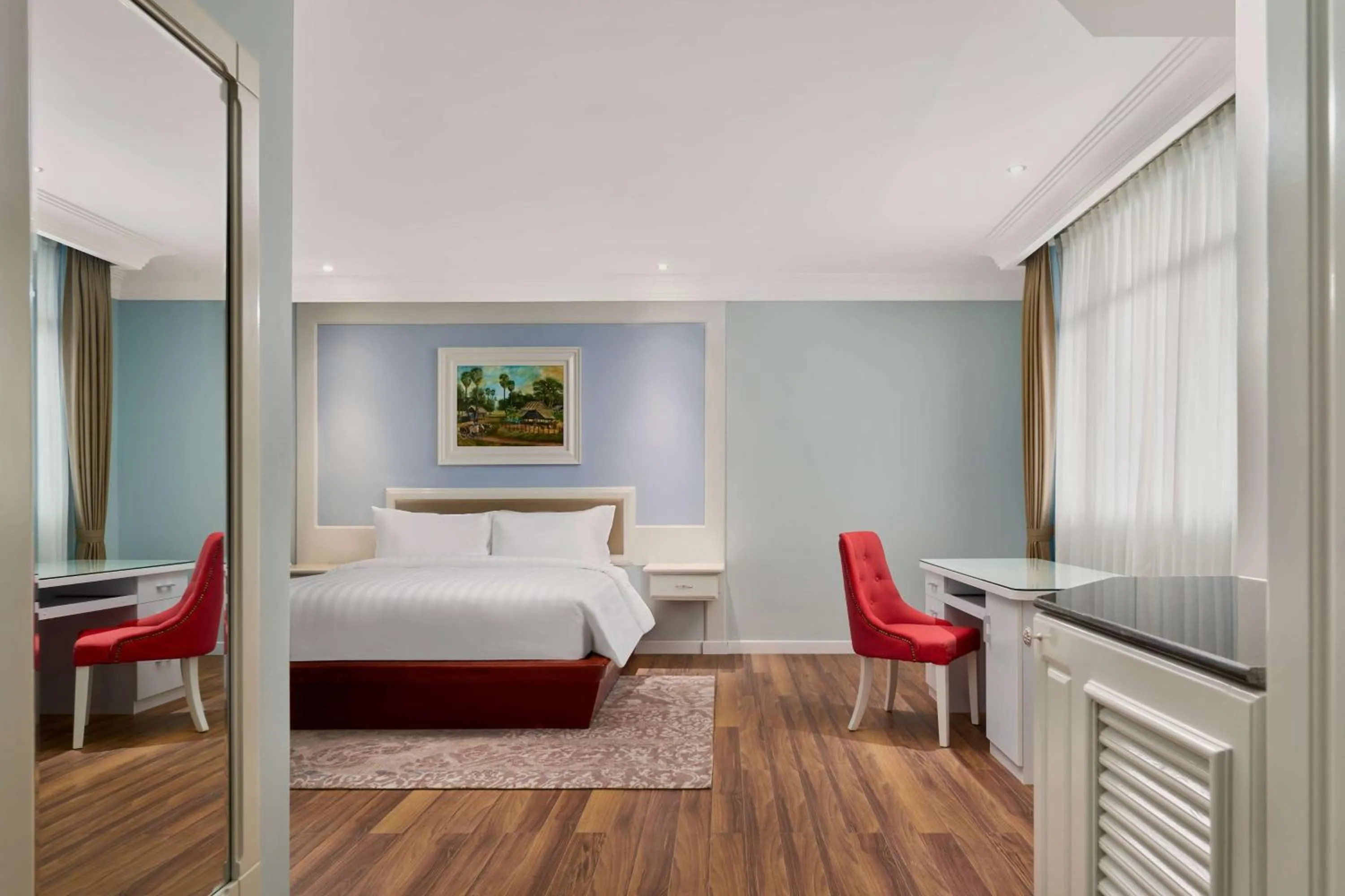 Bed in Wyndham Grand Phnom Penh Capital