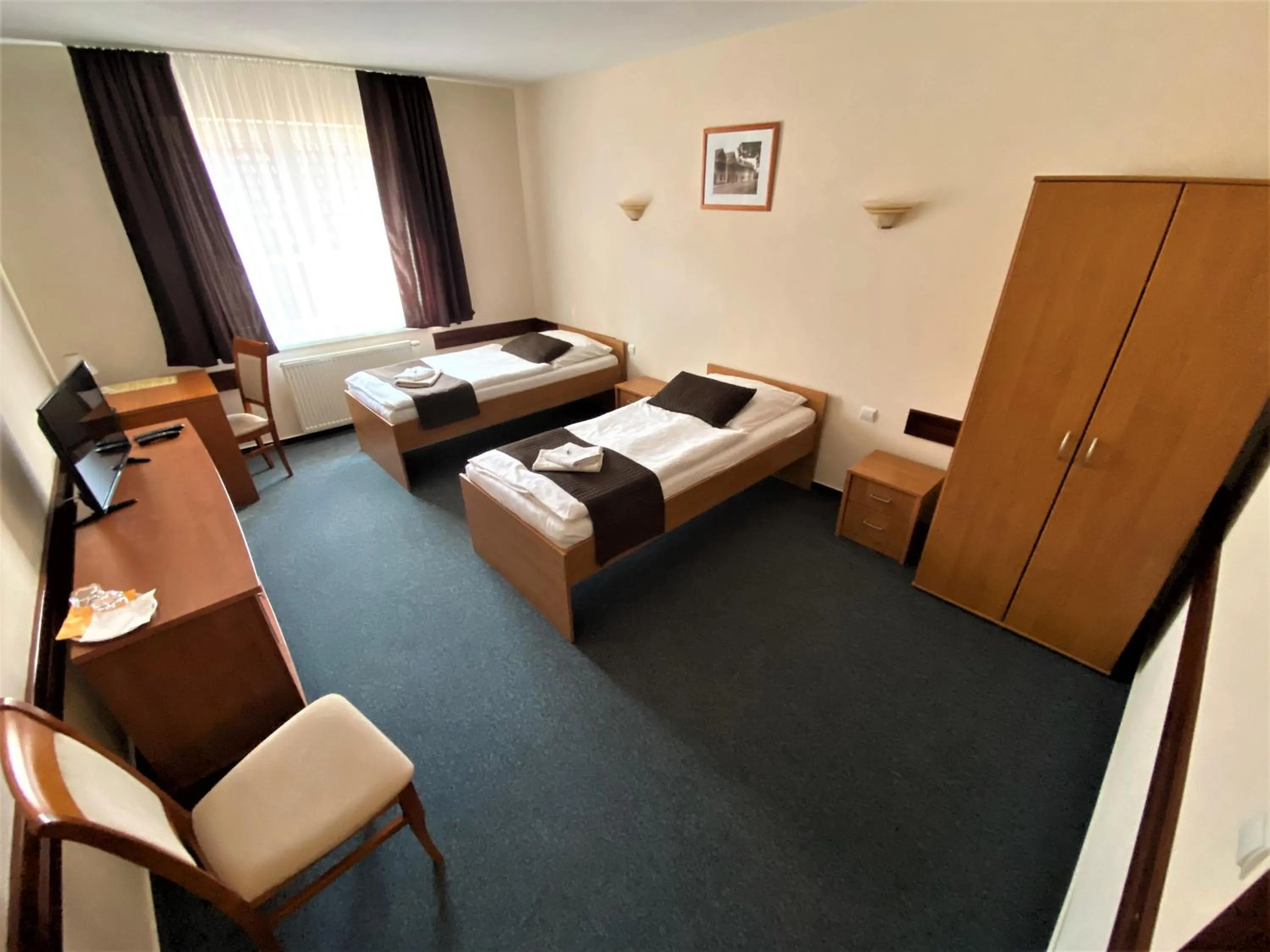 Bed in Garni Hotel Tatramonti